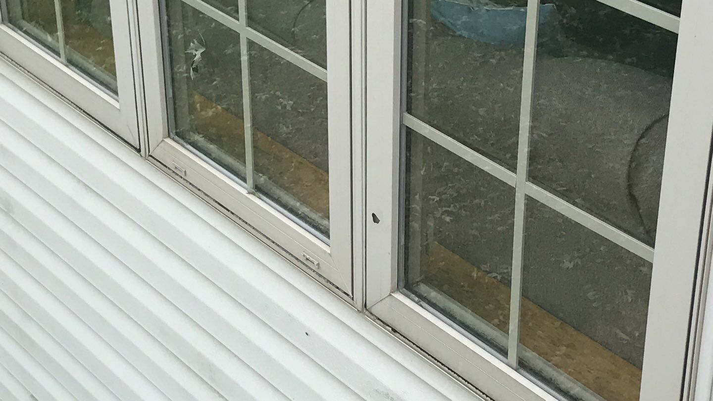 Storm Damage Restoration using Atlas Pinnacle Shingles and Mastic Vinyl Siding  by MODERN EXTERIOR SYSTEMS