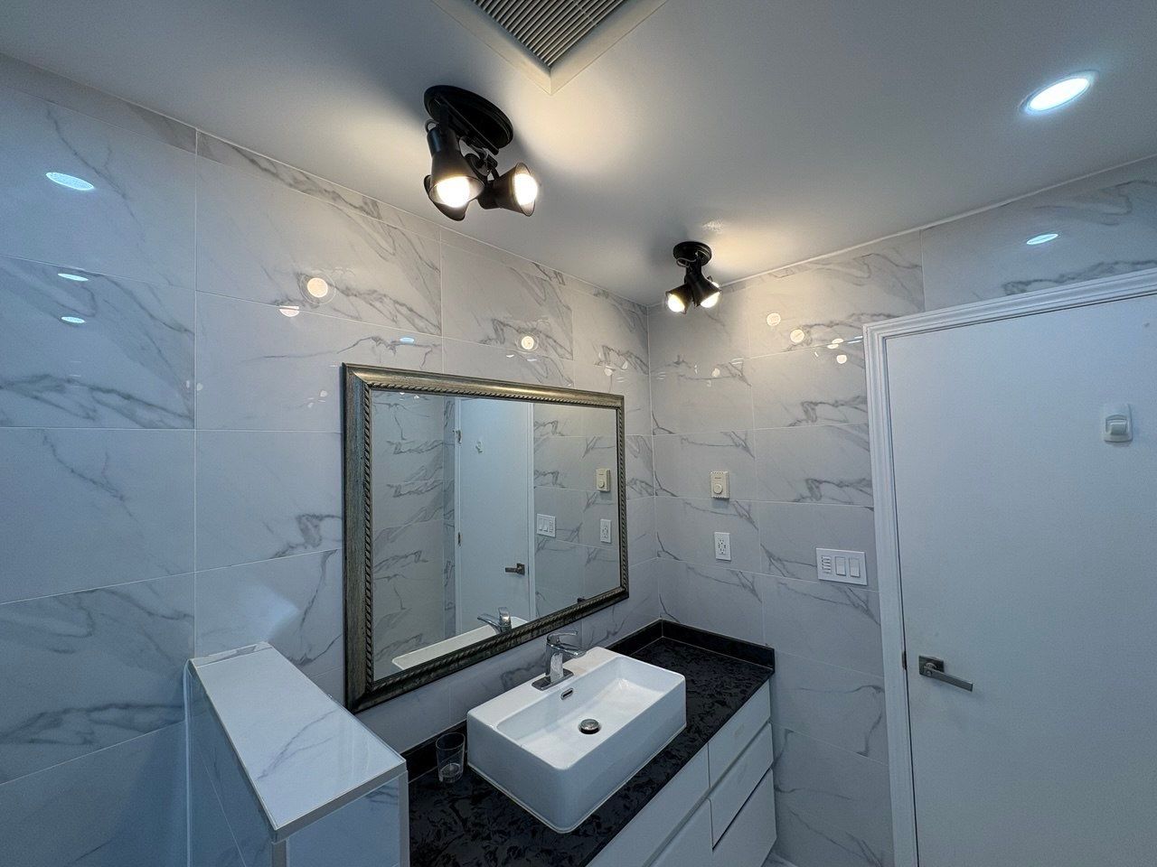 Water Damage Restoration & Bathroom Renovation in West Vancouver by YVR Construction Group