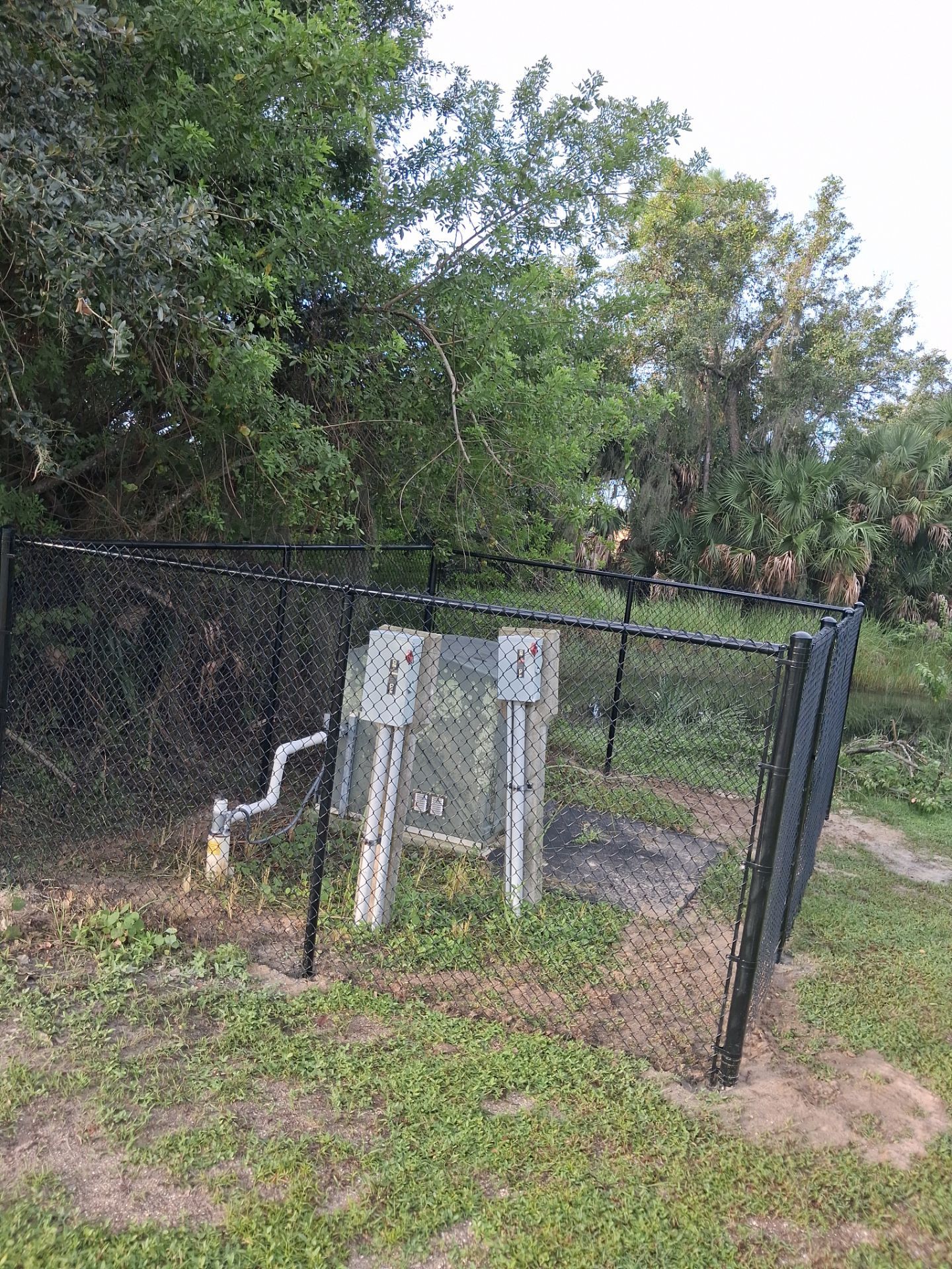 Commercial Black Chain Link Fence Installation in North Port by True Fence LLC