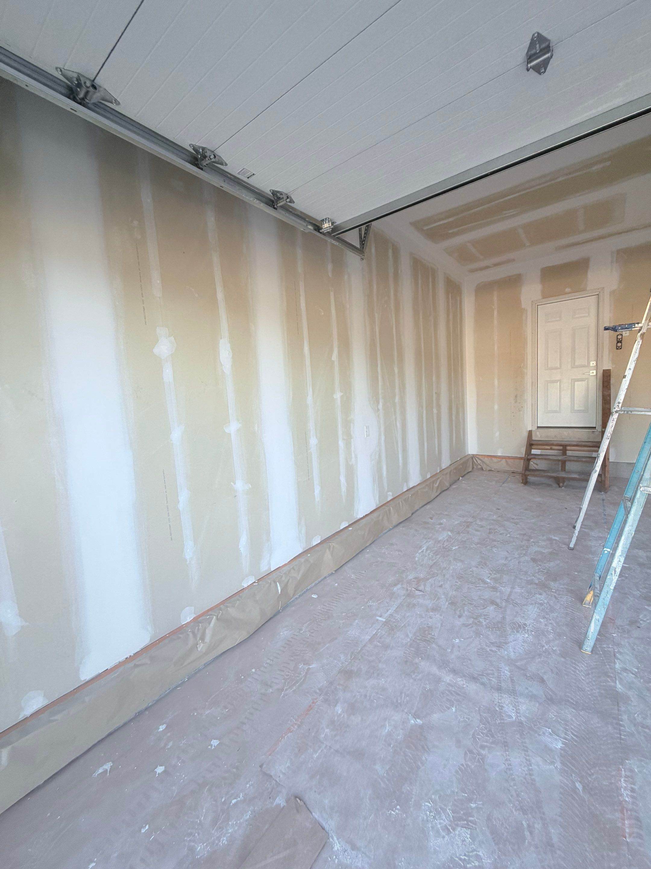 Full Garage Interior Drywall Finishing and Priming in Sioux Falls by Select Painting, Coatings & Garage Cabinets