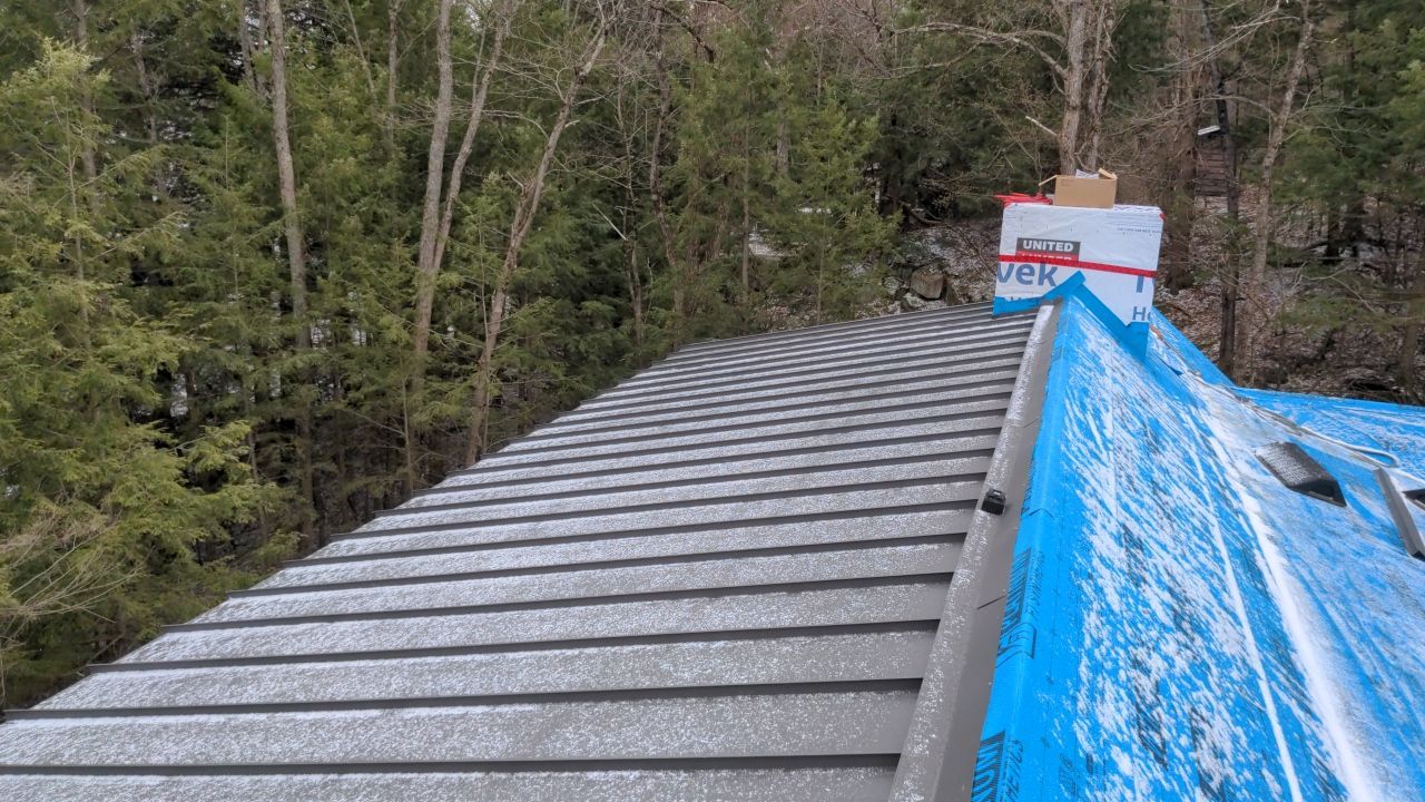 New Home Construction using 16" Standing Seam Panels by Jay Carter Roofing & Sheet Metal