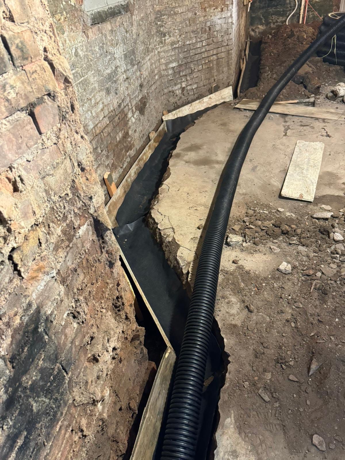 Interior French Drain & Wall Vapor Barrier in Newark, NJ  by Pure Service Pro, LLC 