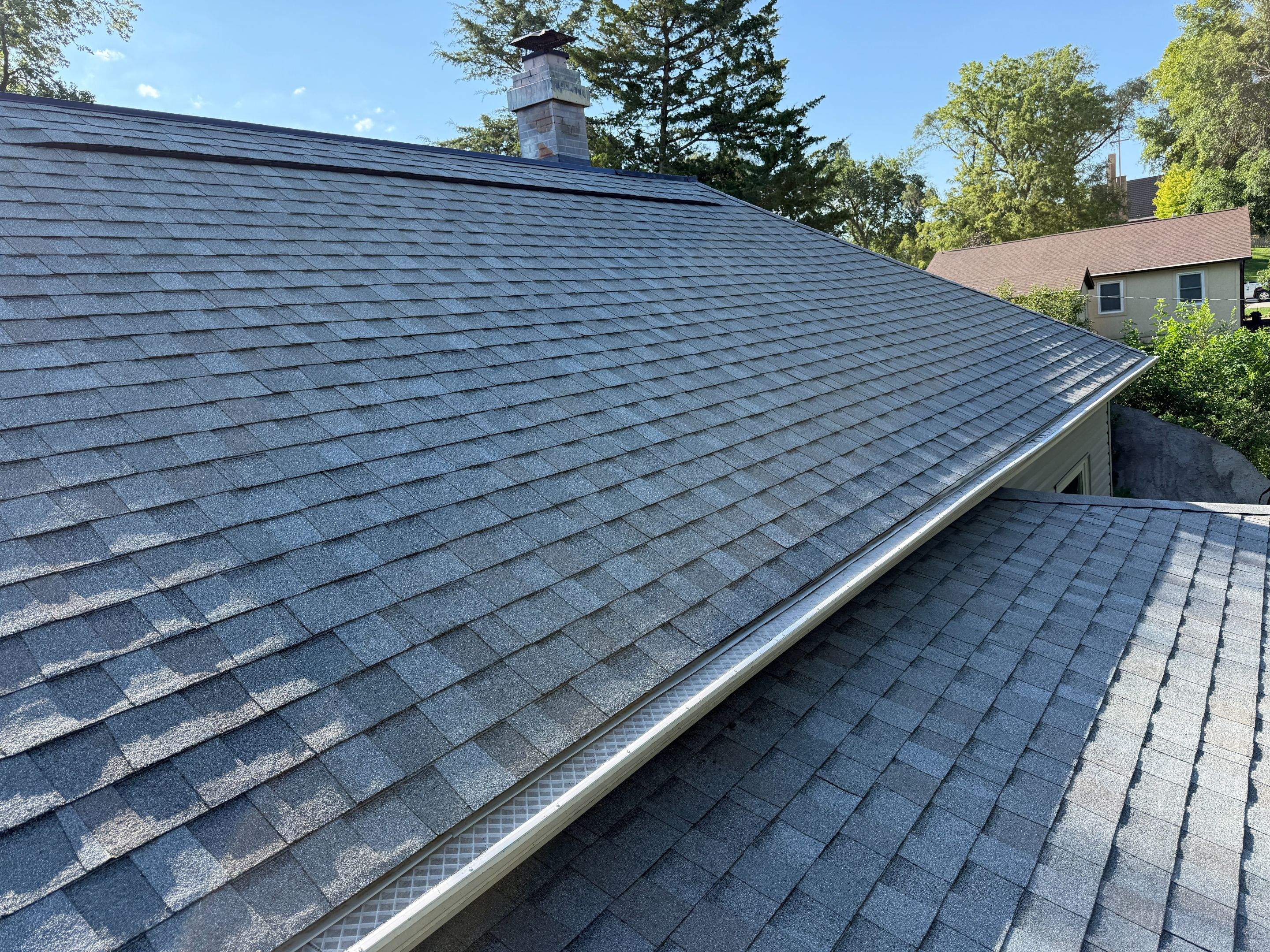 Asphalt Shingle and EPDM Membrane Roof Installation in Mineola by Star Home