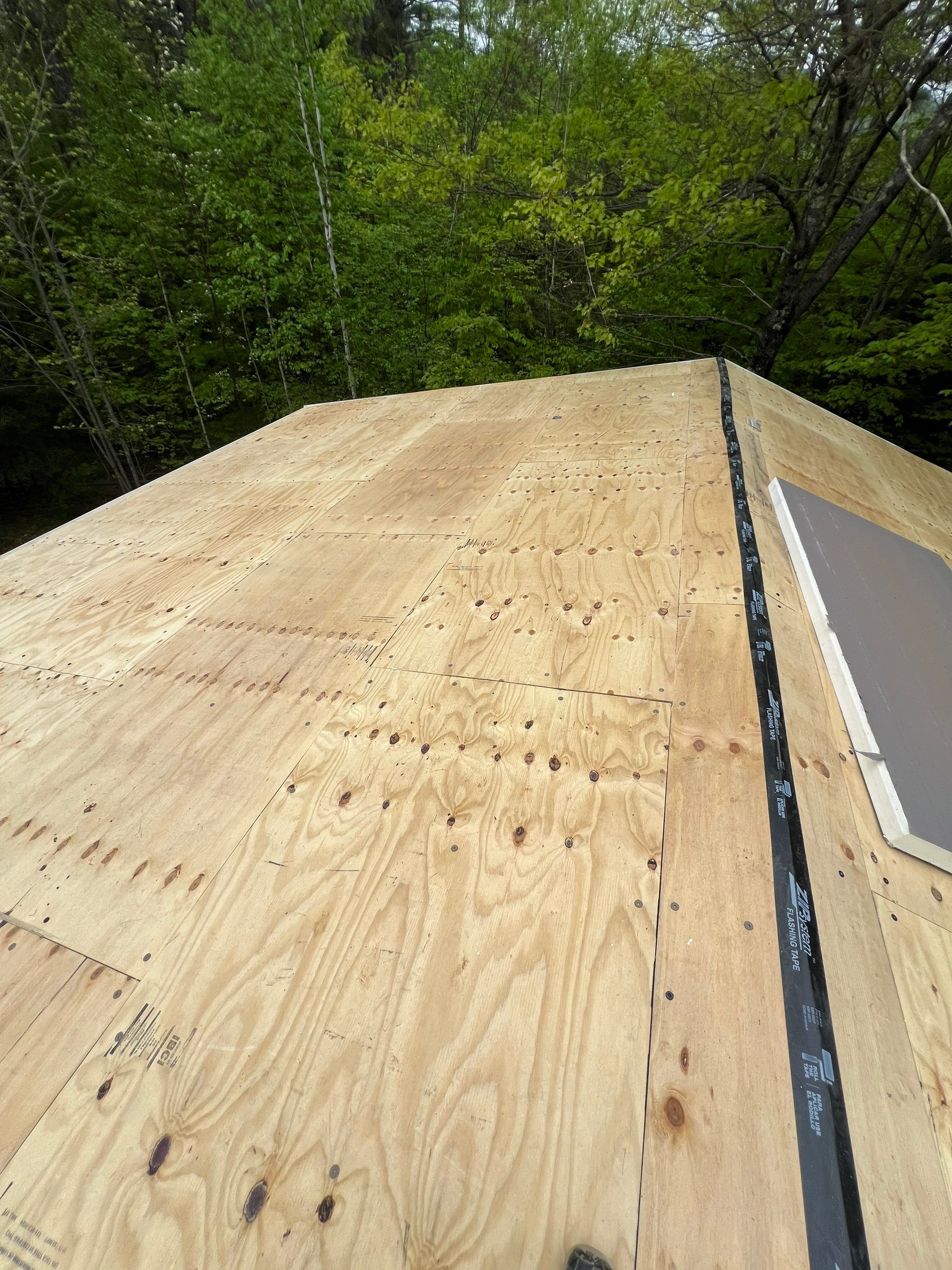 Warm Roof Install On a Deck Home by Tall pine roofing