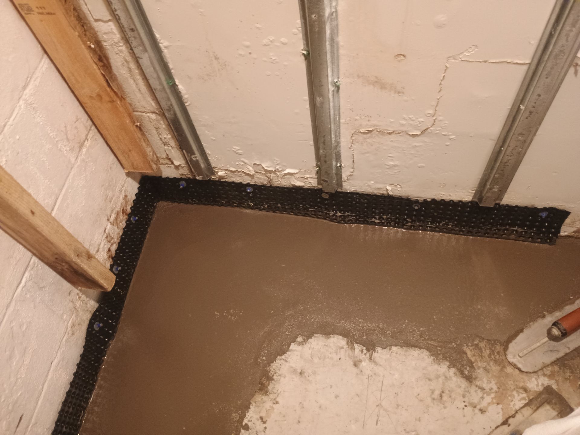 Interior Drain Tile Waterproofing in Columbia Heights, MN by Waterproofing Northeast