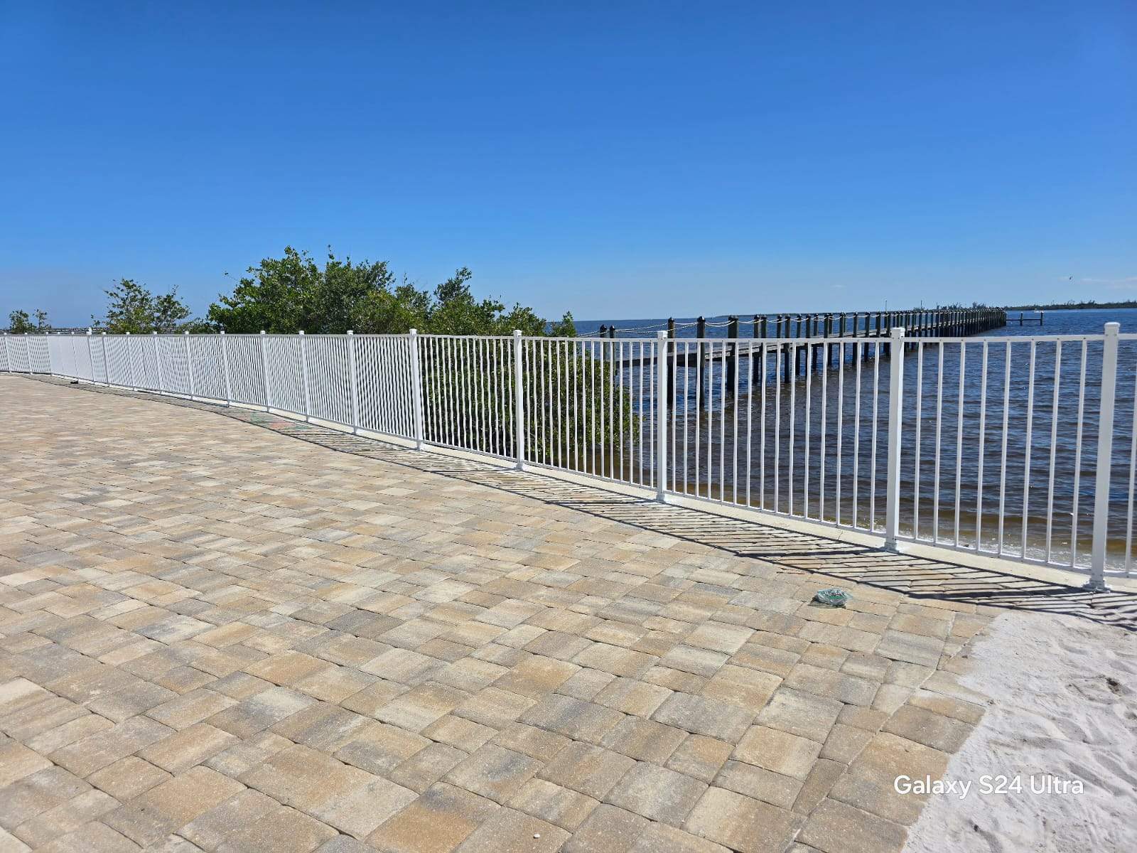 White Aluminum Railing Installation for Commercial Property in Port Charlotte by True Fence LLC