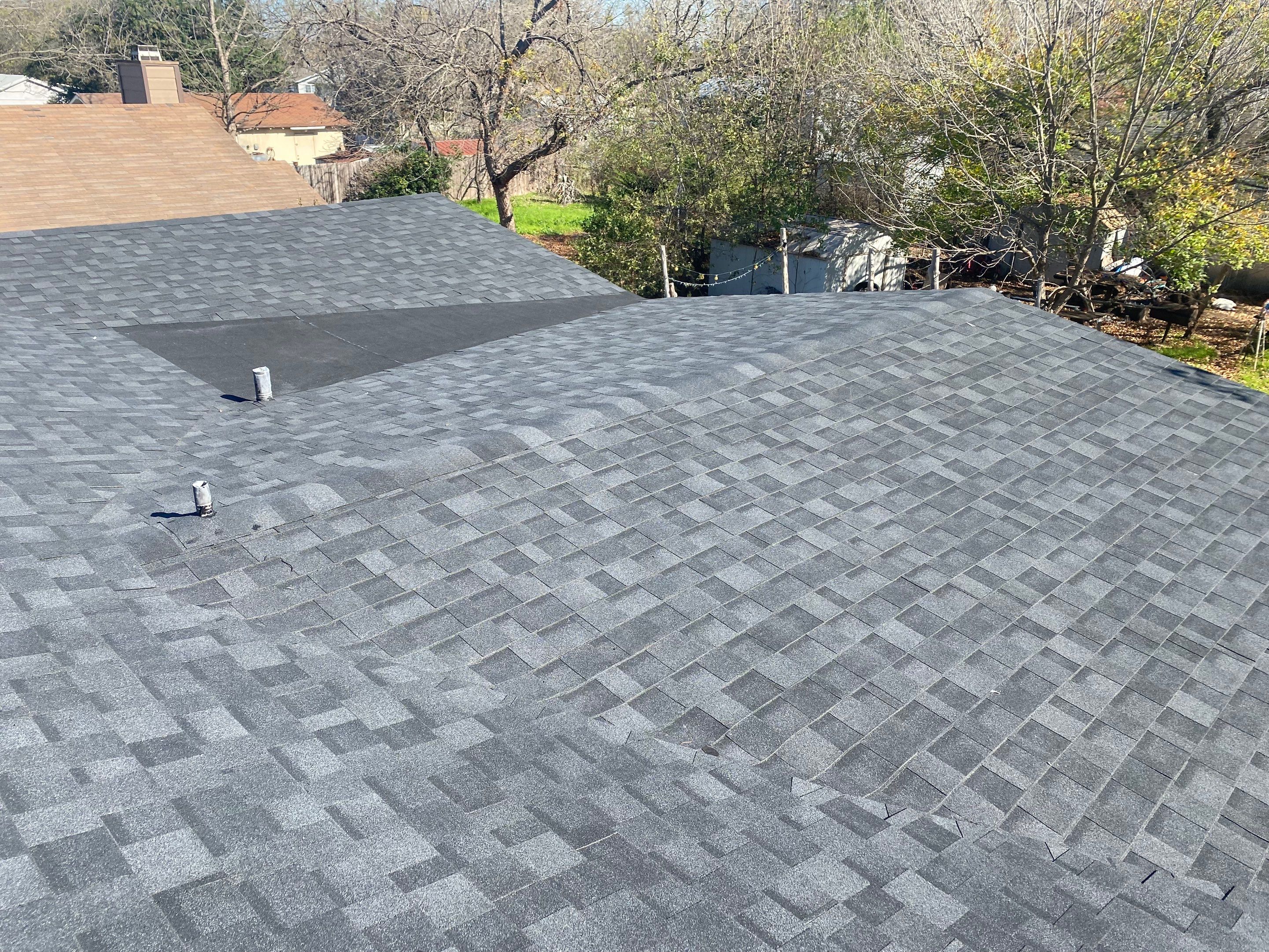 Estate Gray Shingles by Reimagine Roofing