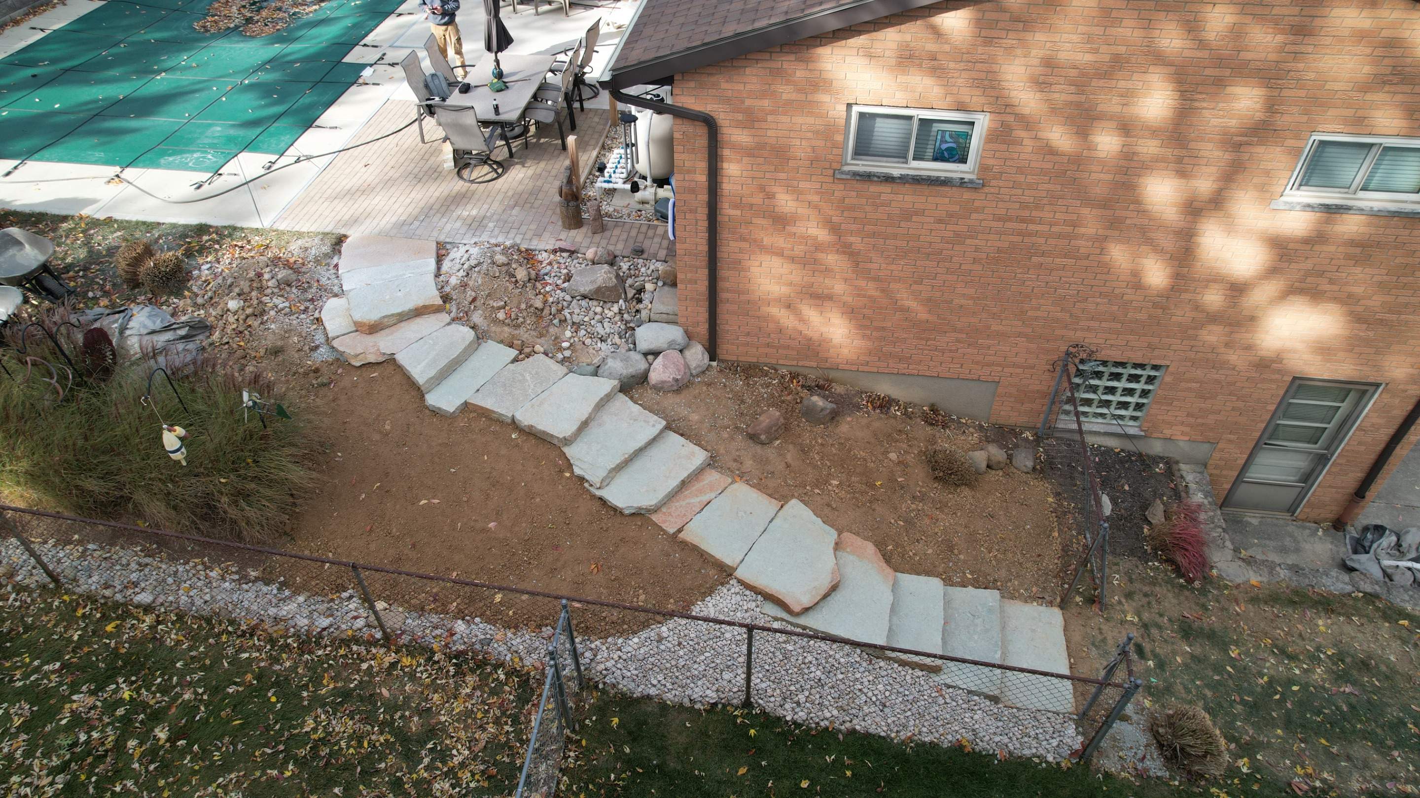 Rustic Buff Tread Stairway Installation by Reisenberg’s Lawn & Landscape, LLC