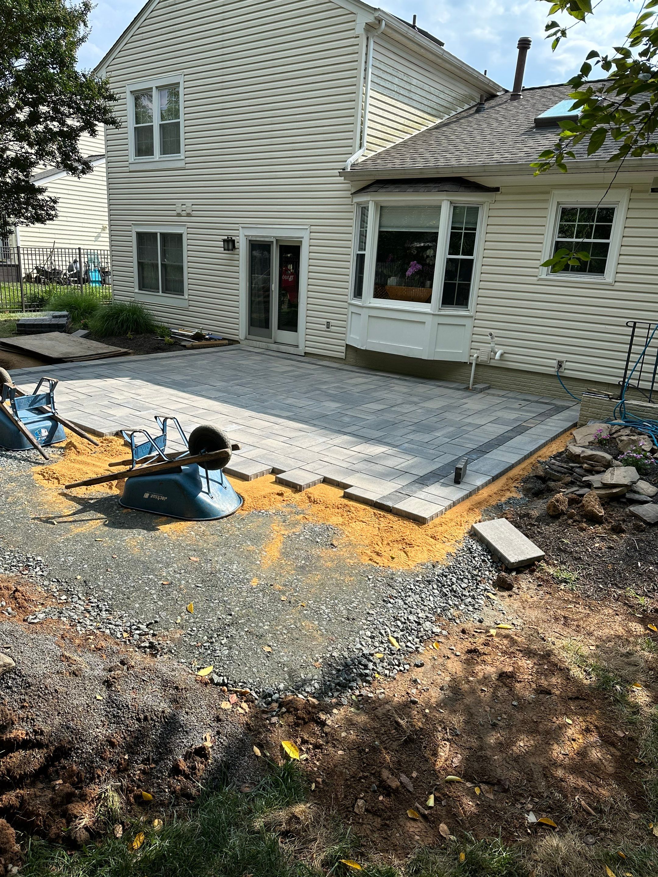 Backyard Transformation using Techo-Bloc Pavers by The Smet Companies, LLC