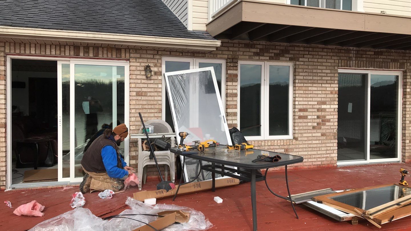 Deck Refurbush and Door Replacement using Trex Decking and Railing. Polaris Patio Doors by Secure Construction Company Inc