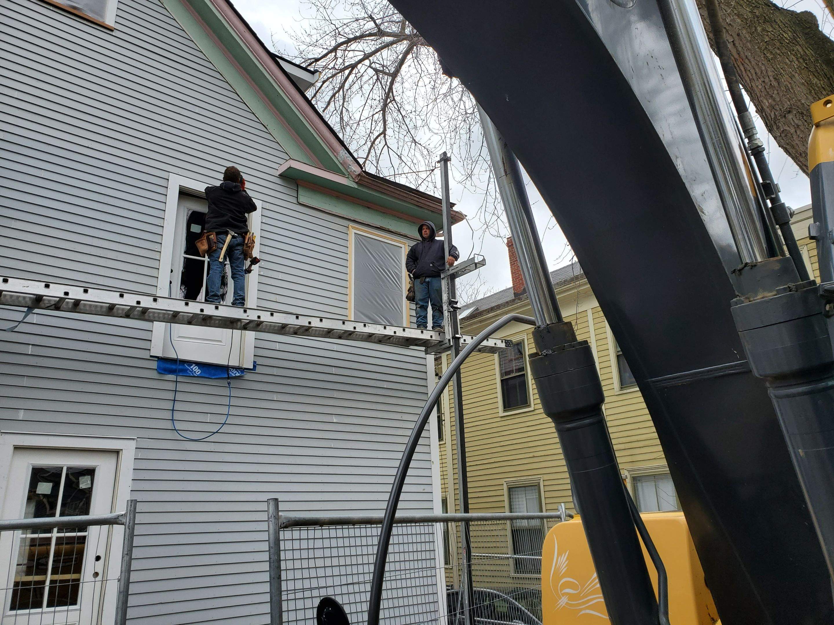 Siding Installation using Wood Clapboards by UBrothers Construction