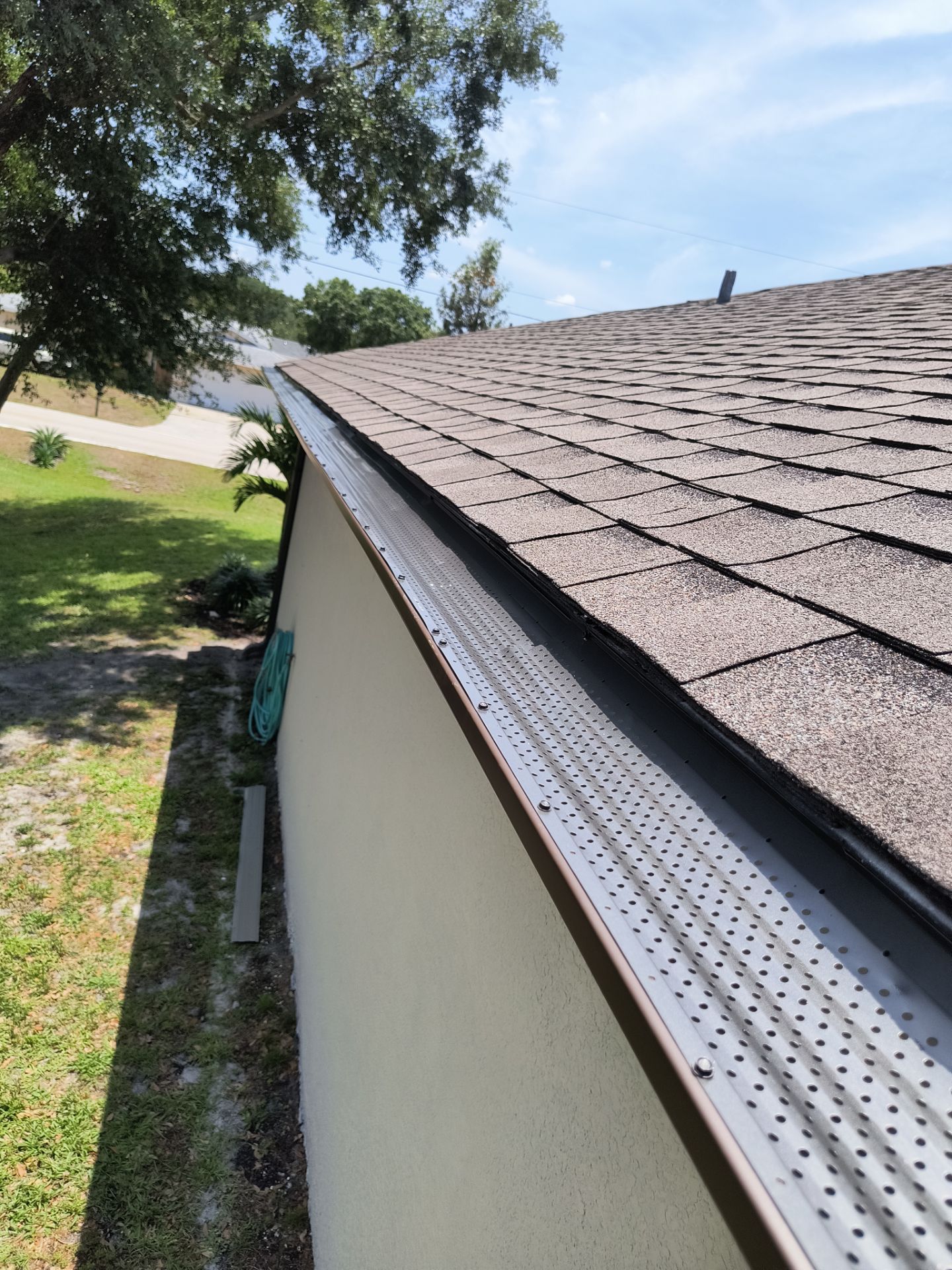 Custom Seamless Gutters and Downspouts for Large Homes in Tampa FL by Gutter Professor by Gutter Professors