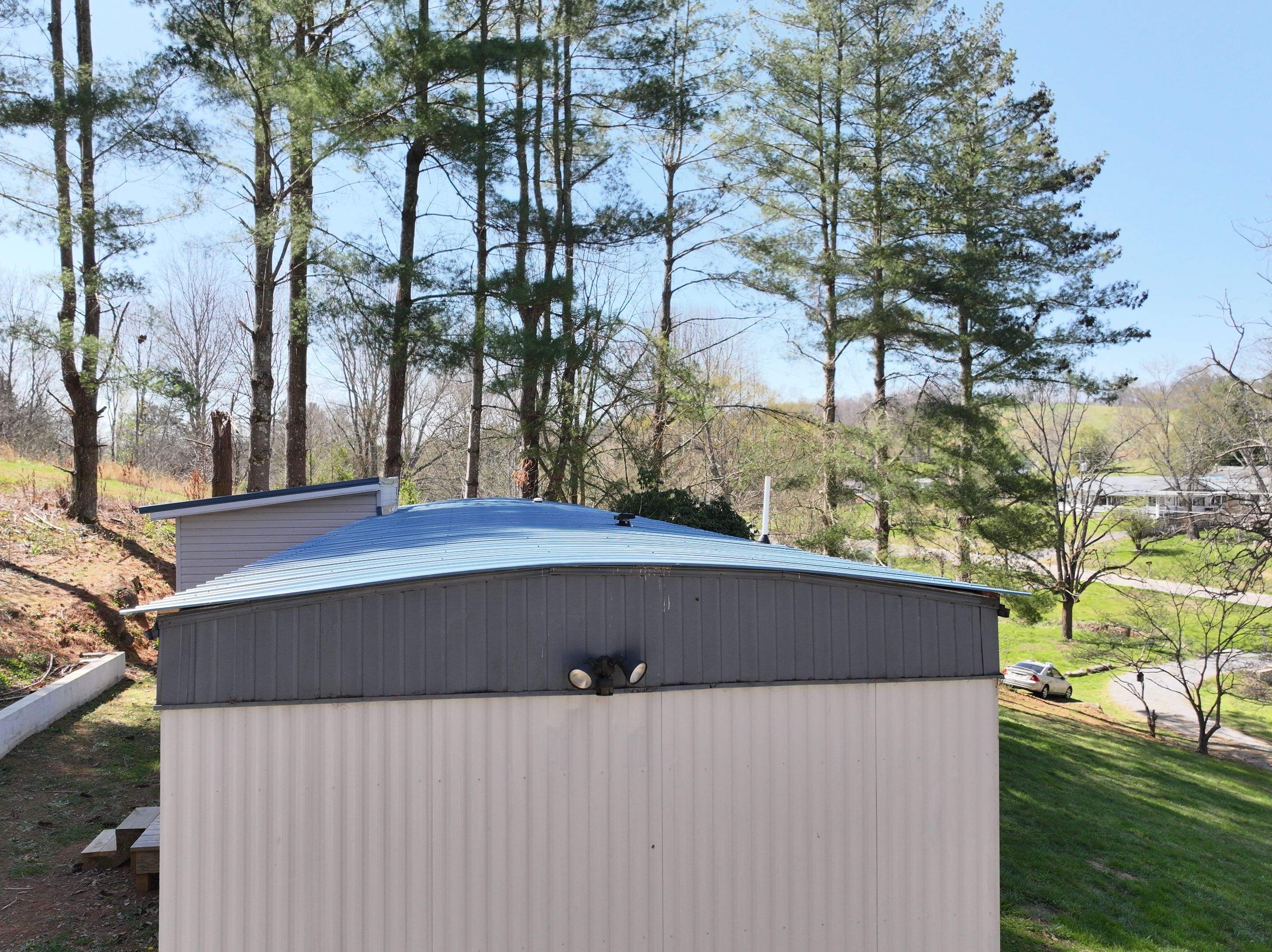 Hill Residence by Omnia Roofing