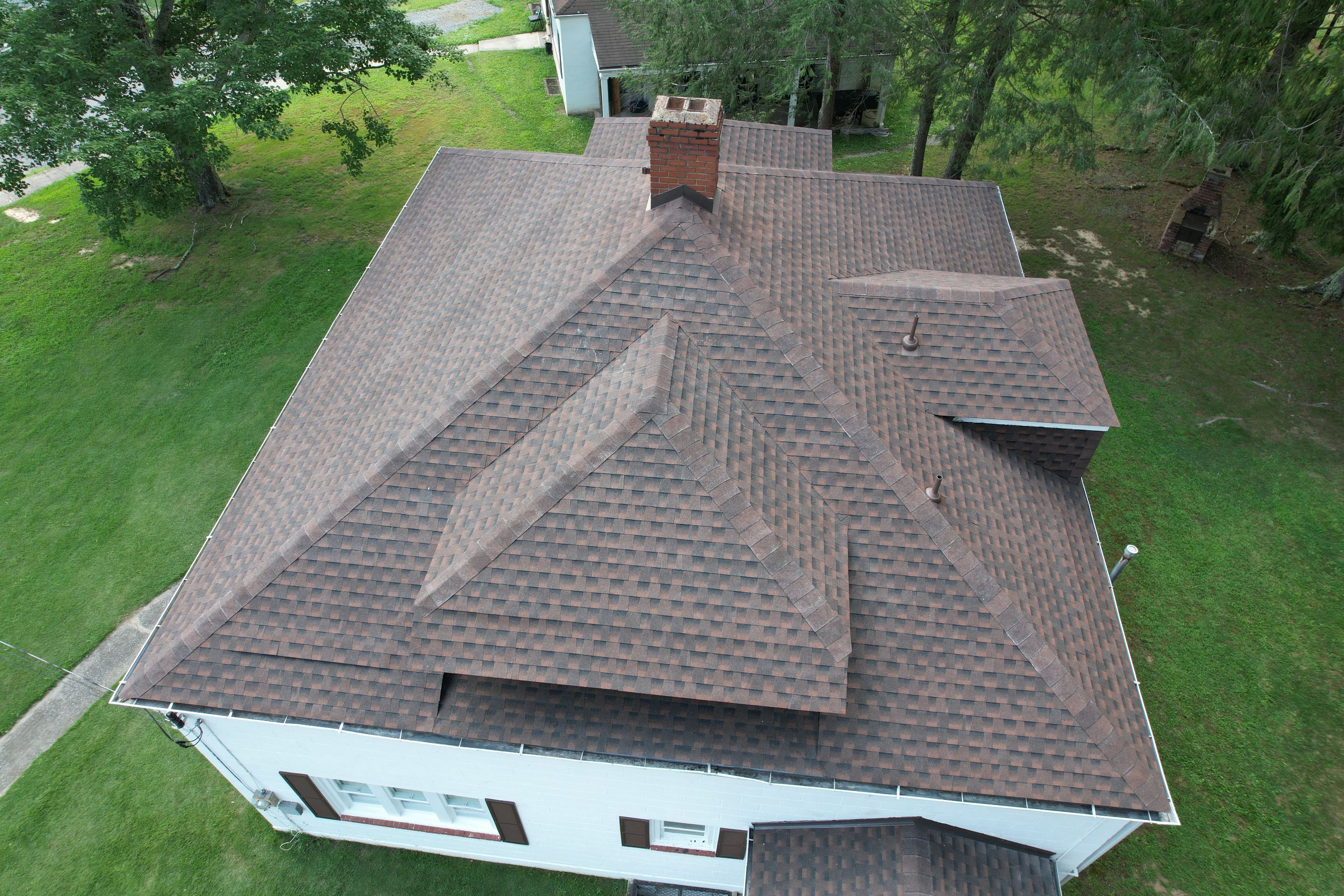 Residential Roofing Installation using GAF TImberline HDZ Hickory by Rainstoppers Roofing