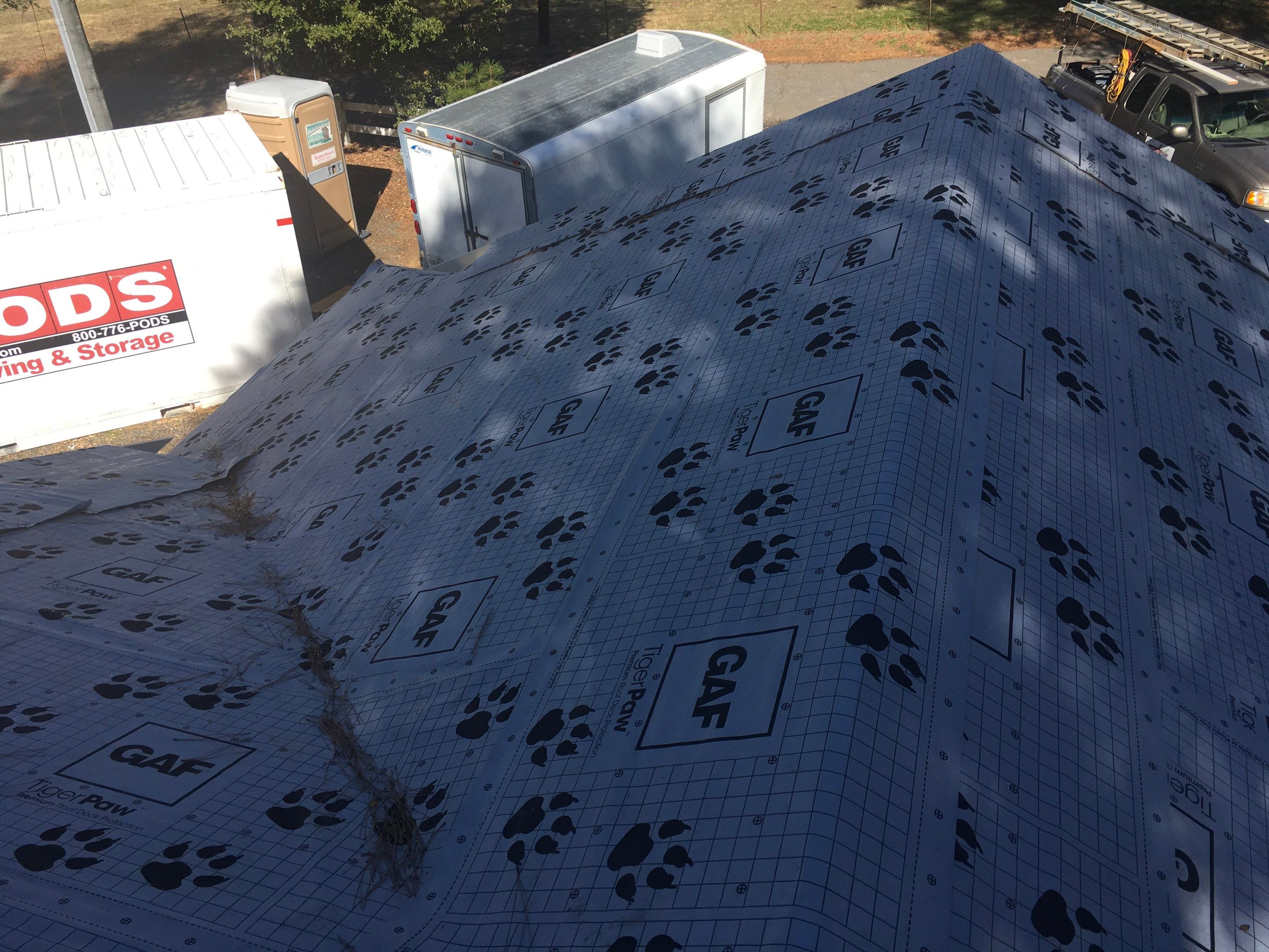 Metal roofing installation using Standing seam metal roofing system by Straight Edge Roofing Inc