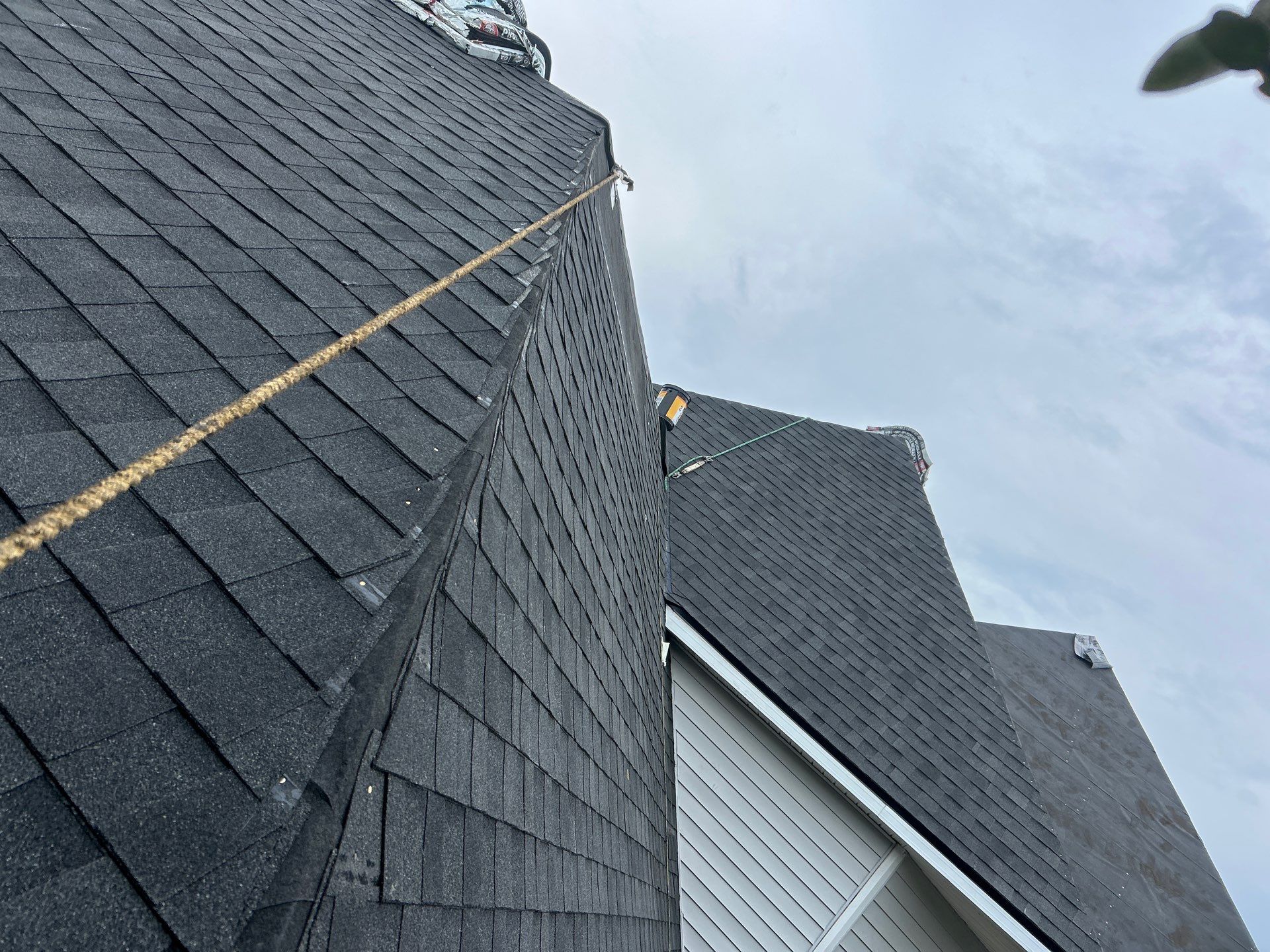Residential Roofing Installation with Black Shadow Shingles in Clermont by Pinnacle Roofing Group