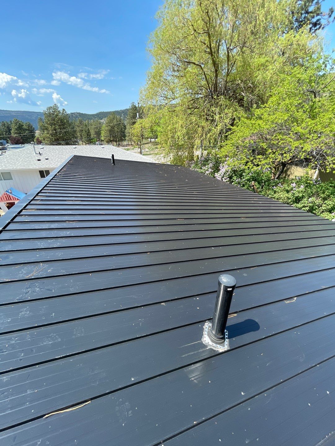 Residential Roofing Installation using 12" Prolok metal  by Top Notch Roofing Inc