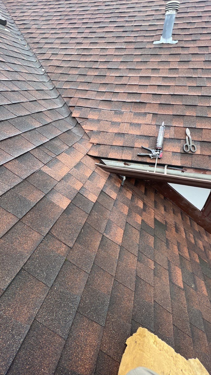 Step flashing repair on roof to wall by Pro Home Services Inc