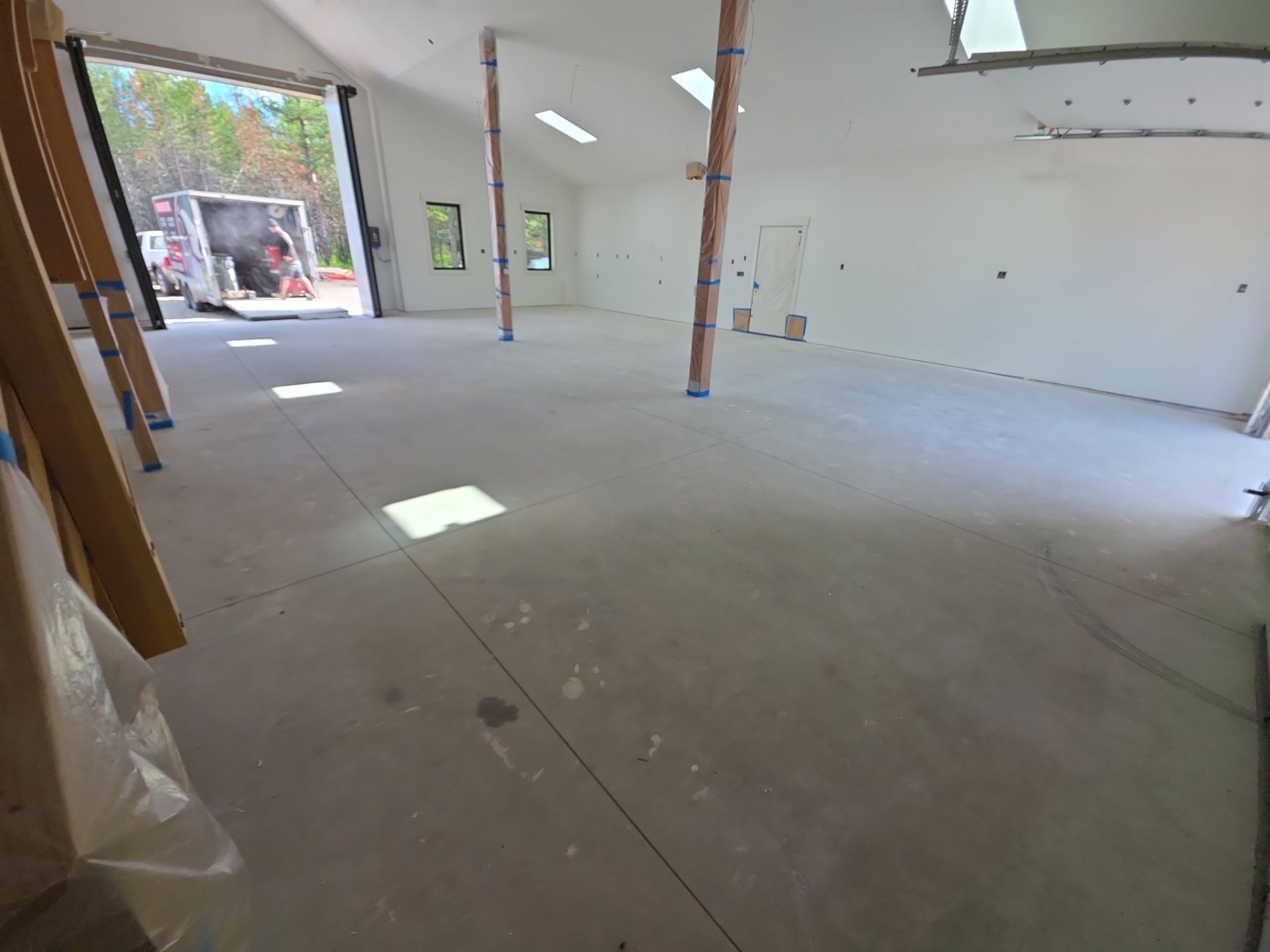 Claystone Hybrid Concrete Floor Coating for Newport Shop Transformation by Croc Coatings, LLC