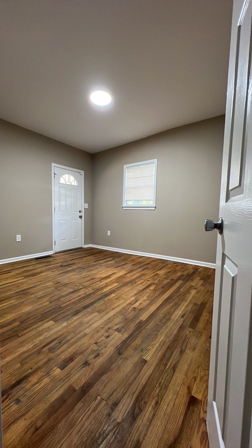 Atlanta Interior Renovation Featuring Hardwood Floors and New Paint by Swift Home Renovations