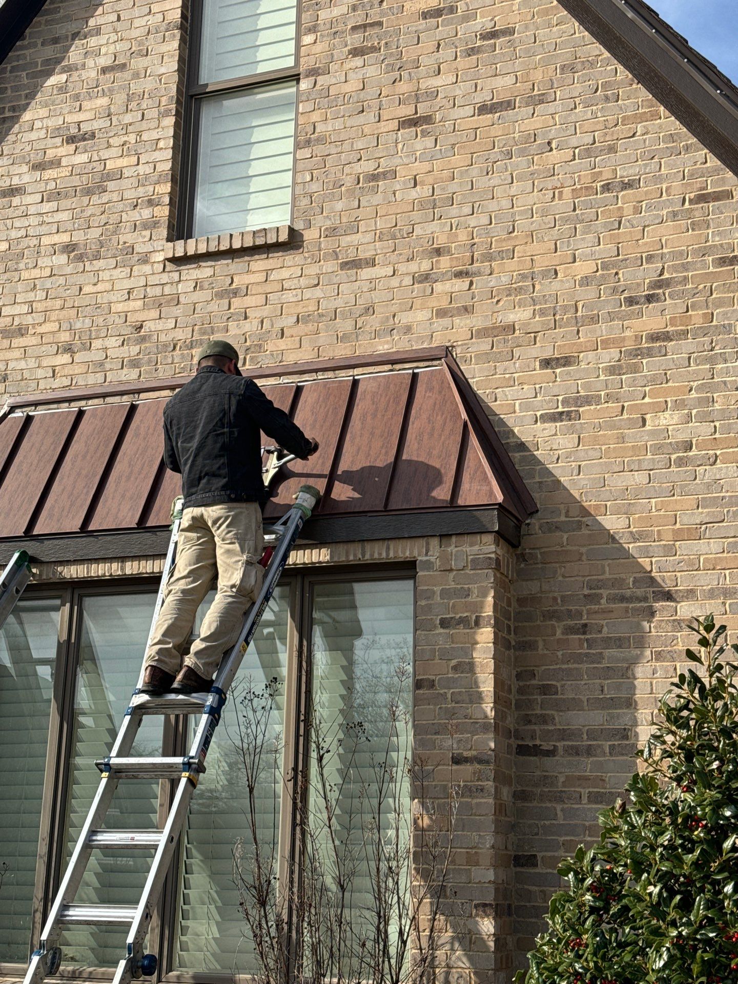 Standing Seam Metal Accent by First Out Roofing 