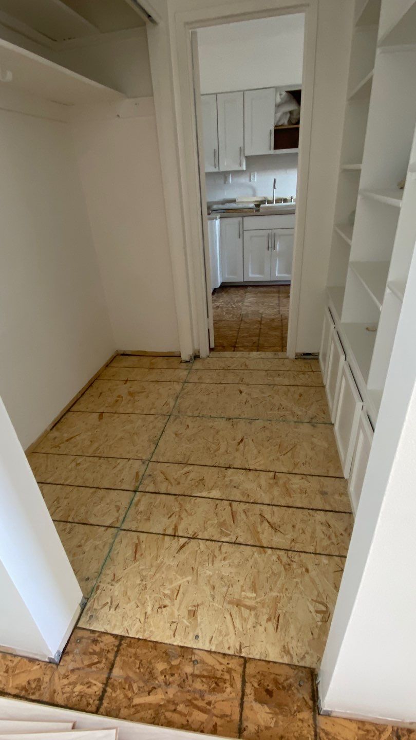 Apartament renovation  using Harwood floor  by Jesus Master Handyman LLC 