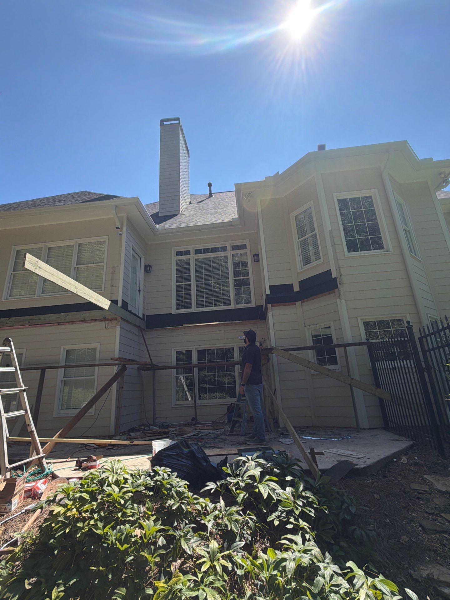 Elevated Composite Deck Replacement with Metal Railings in Smyrna by Swift Home Renovations 