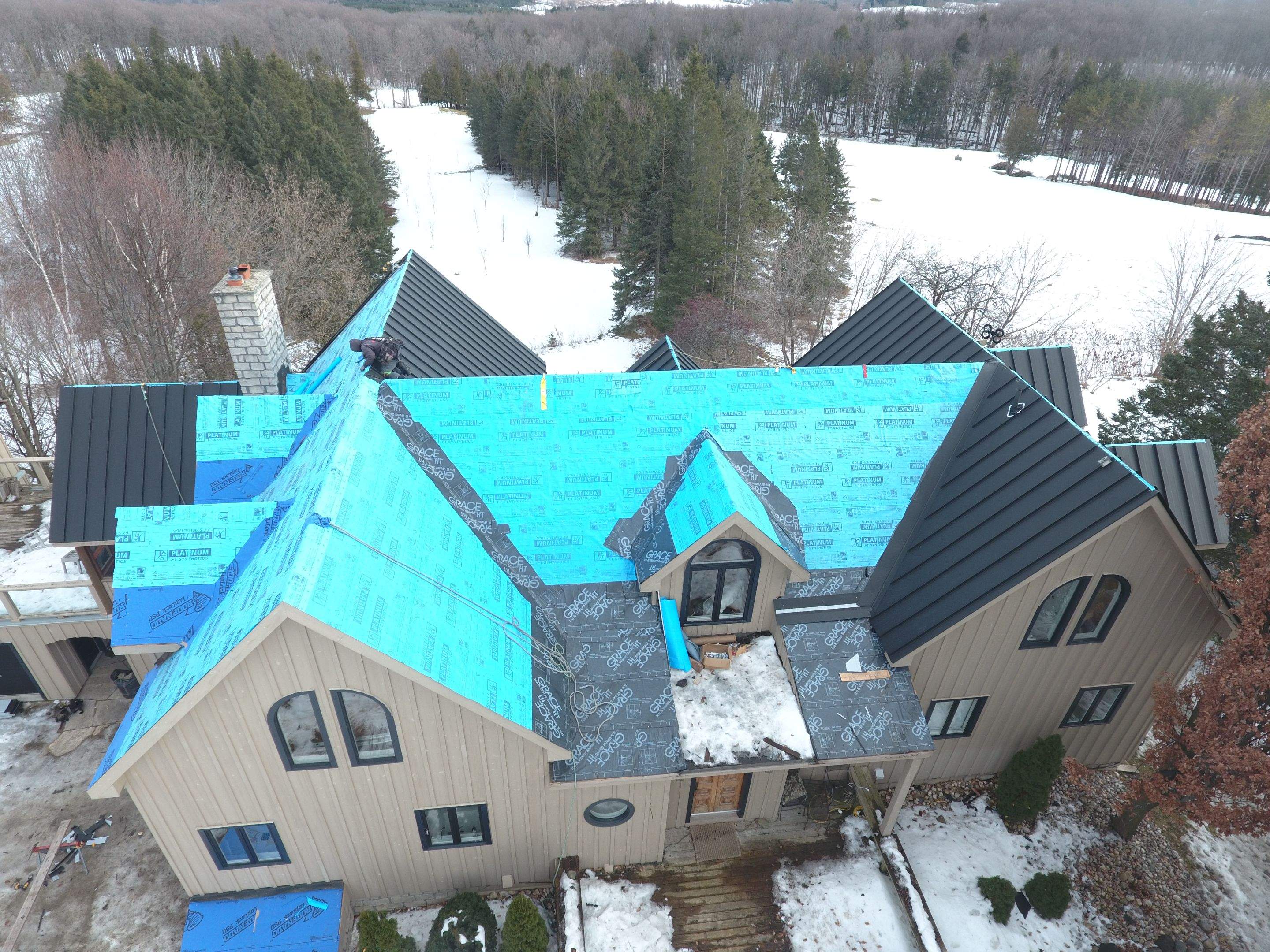 Residential Roofing Installation using 24 Ga Standing Seam Metal by Jay Carter Roofing & Sheet Metal