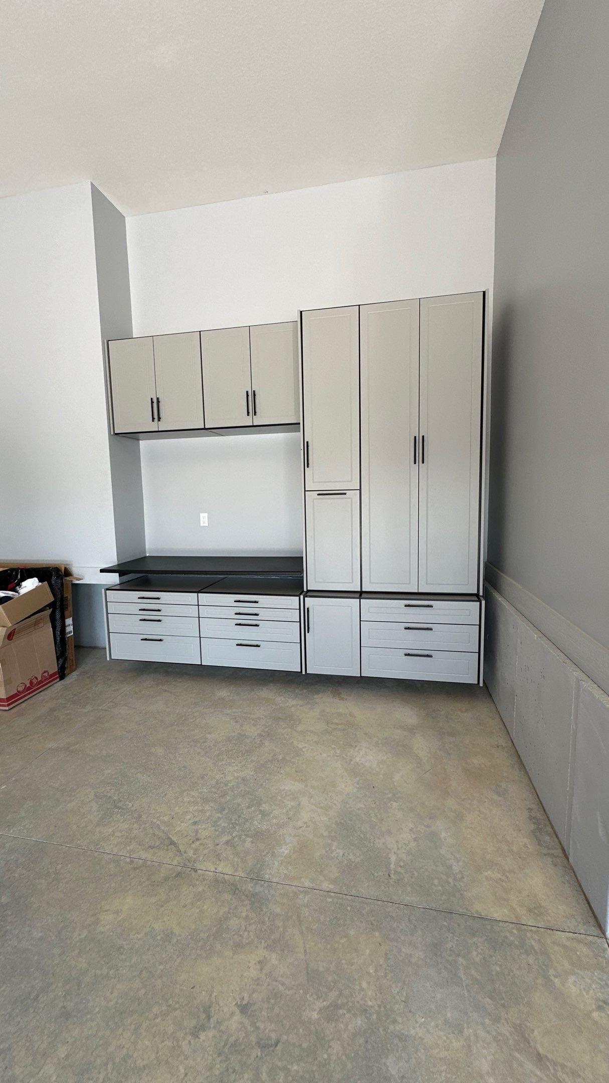 Tom S. made storage a priority in his garage  by Banner Garage