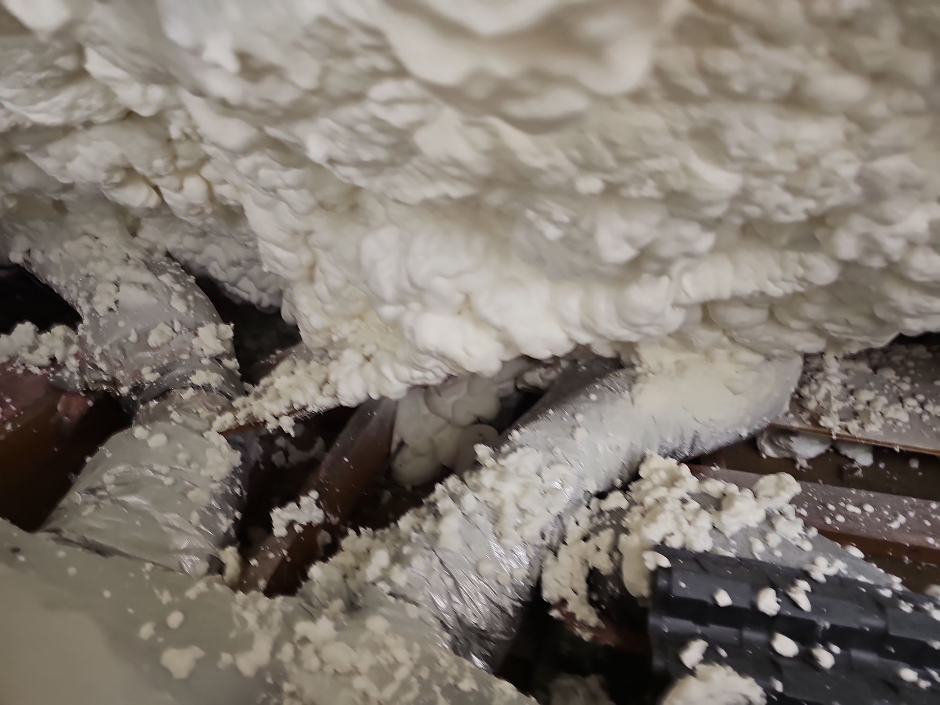 Attic Insulation using open cell spray foam by NYS Foam & Energy