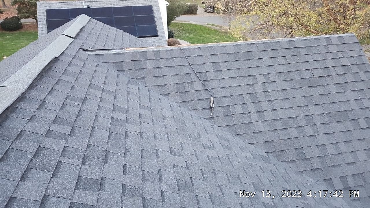Residential Roofing Installation using Certainteed Landmark Moire Black by A Plus Exterior