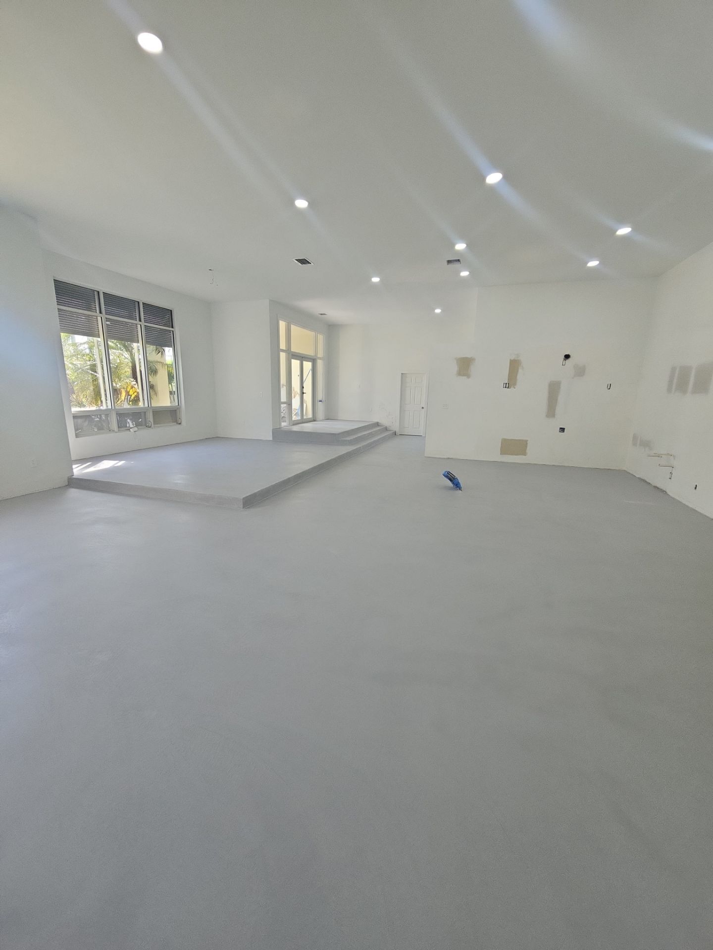 Home Floor Resurfacing w/Microtopping by Seamless Surfaces