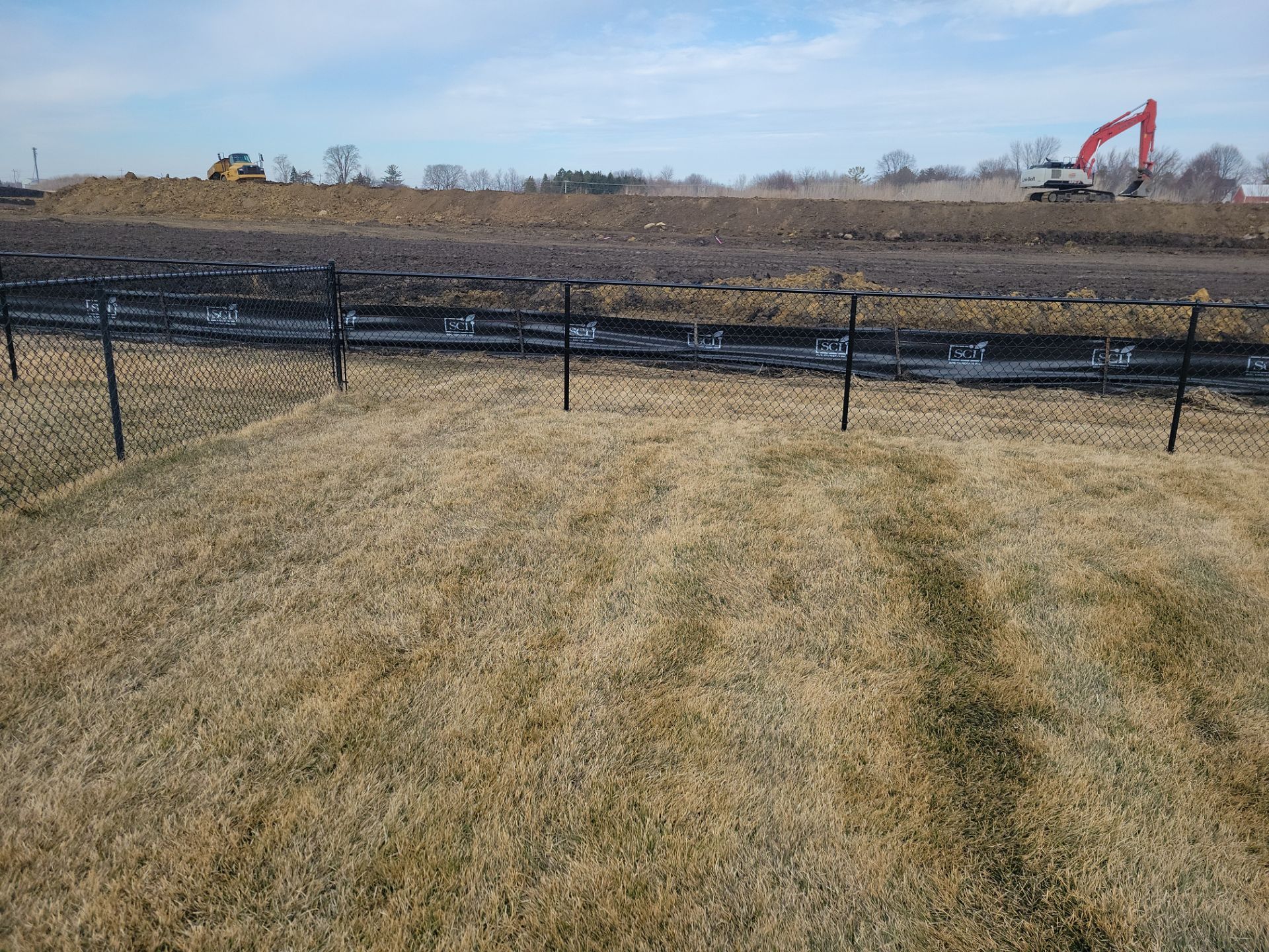 Black Chain Link Fence and Gate Installation in Cedar Falls by Perfect Picket Fence and Stain
