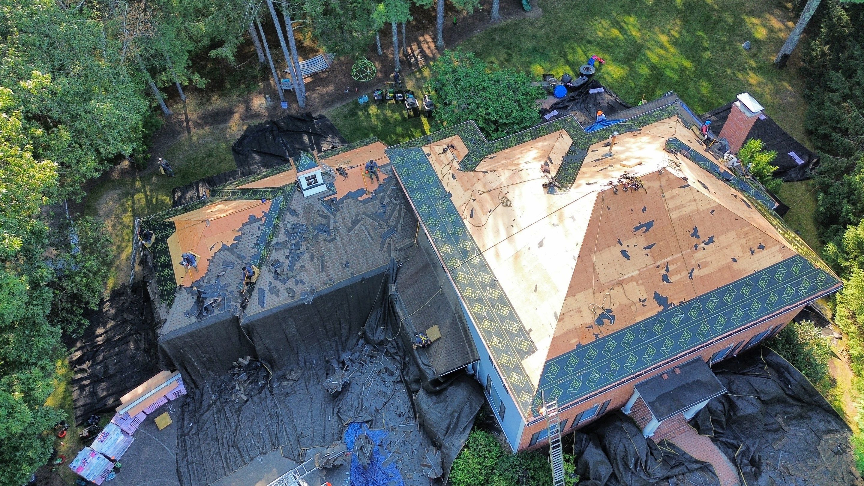 Roof Replacement & Gutter System Upgrade in Westford, MA by Mighty Dog Roofing of Greater Middlesex County