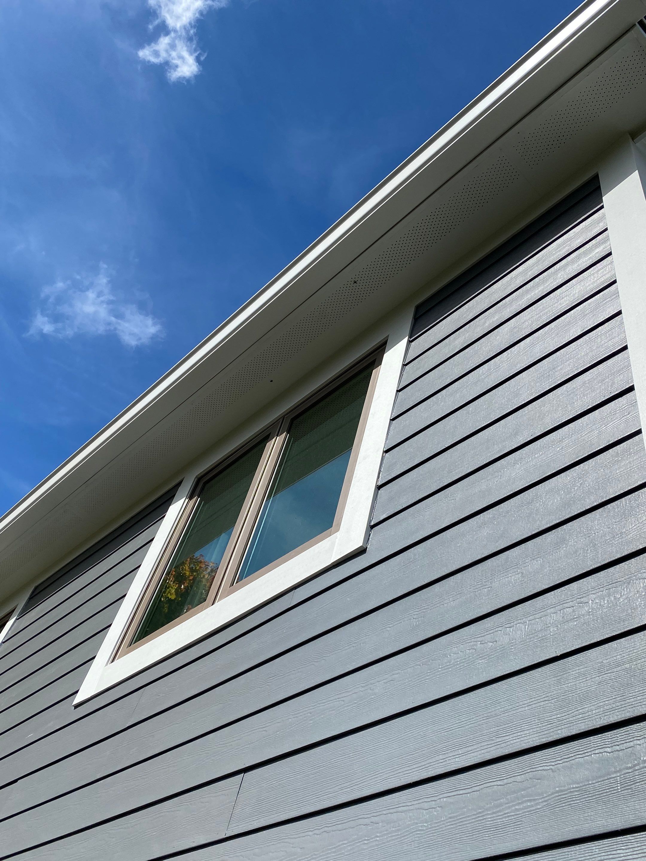 Siding Installation using James Hardie Fiber Cement Lap Siding by Best Roofing & Siding Company