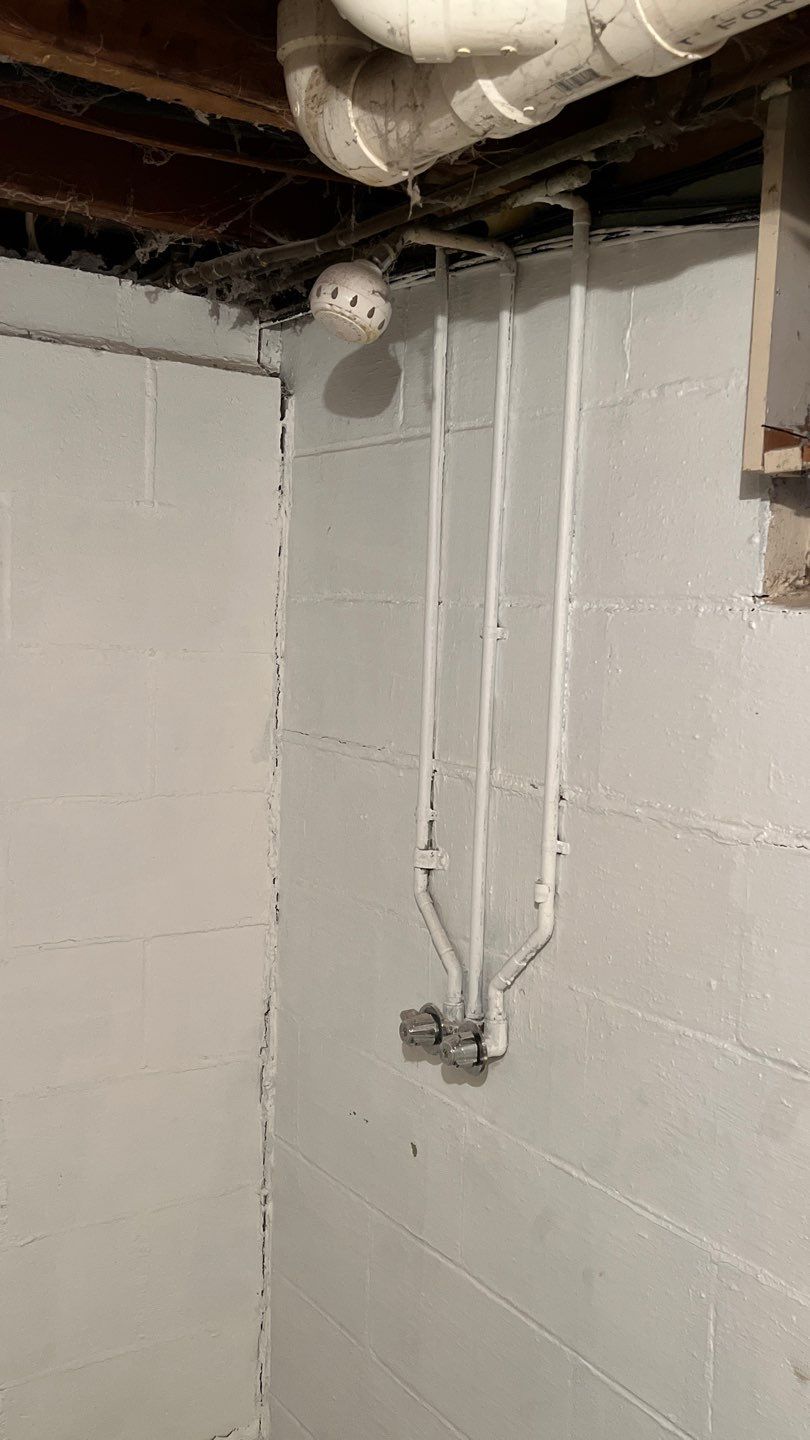 Interior drain tile system installation by ACE Waterproofing & Basement Solutions