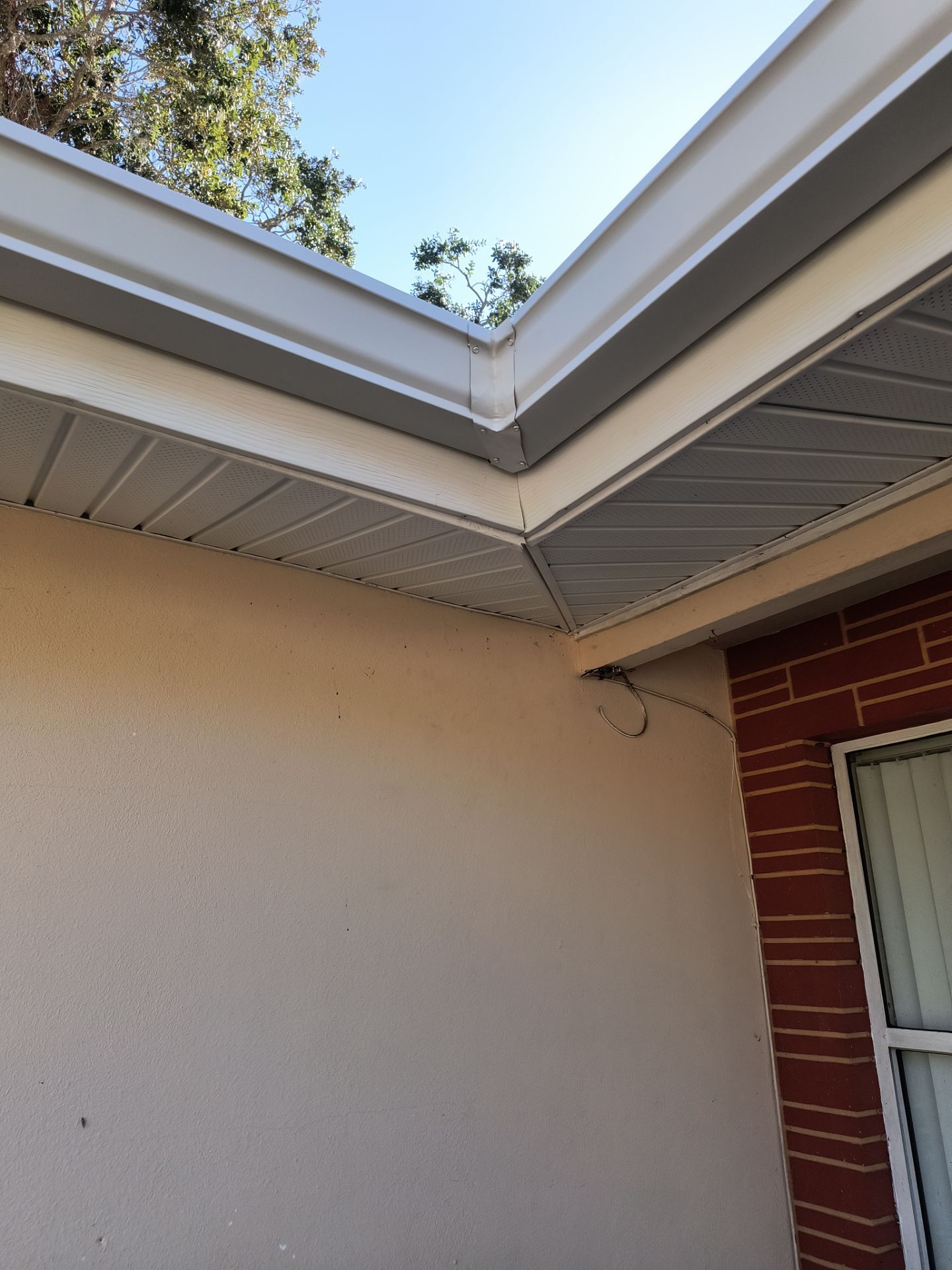 White Soffit and Fascia Upgrade in Sarasota FL by Gutter Professors