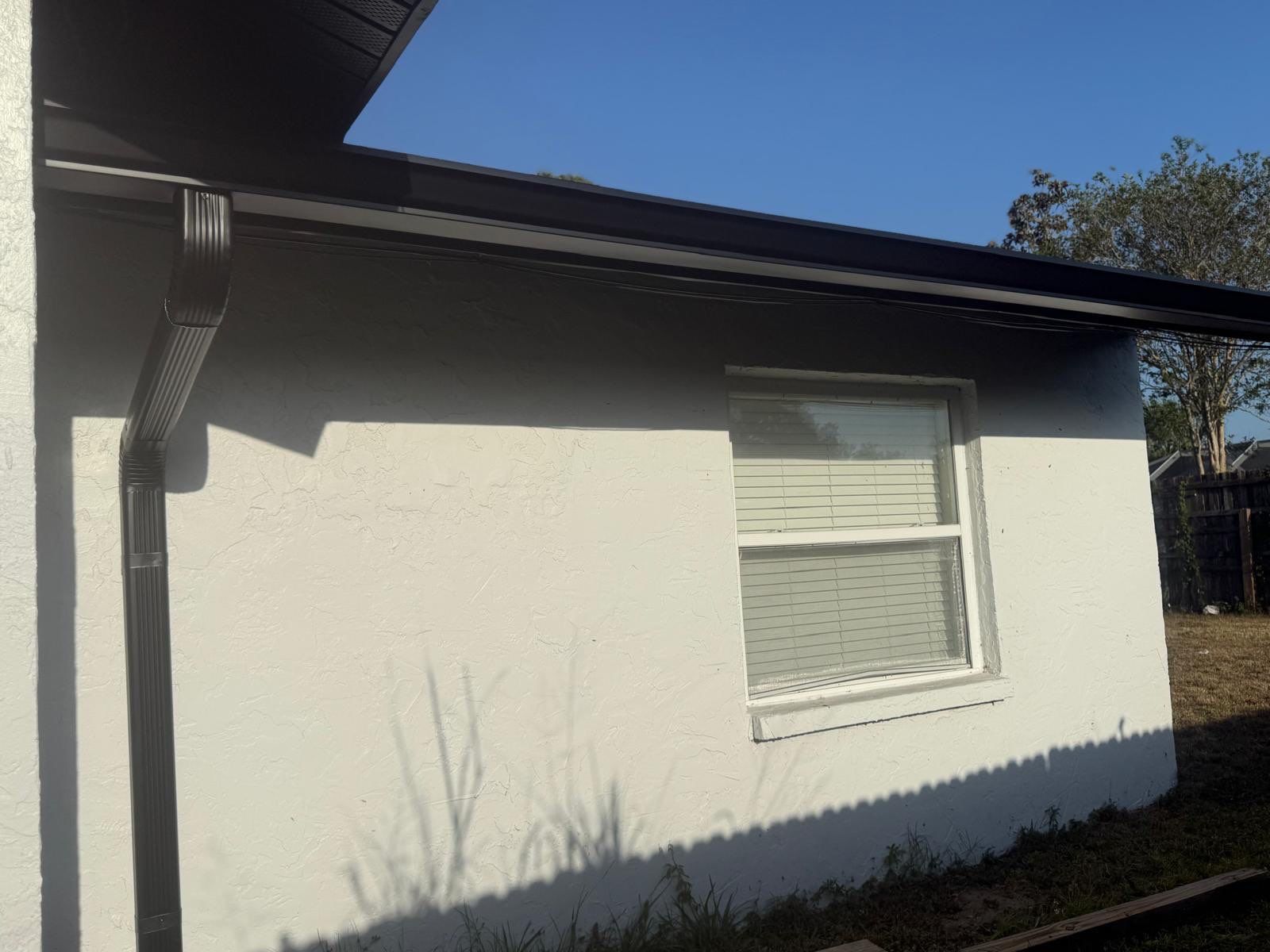 New Downspouts and Splash Guards in Sarasota FL by Gutter Professors