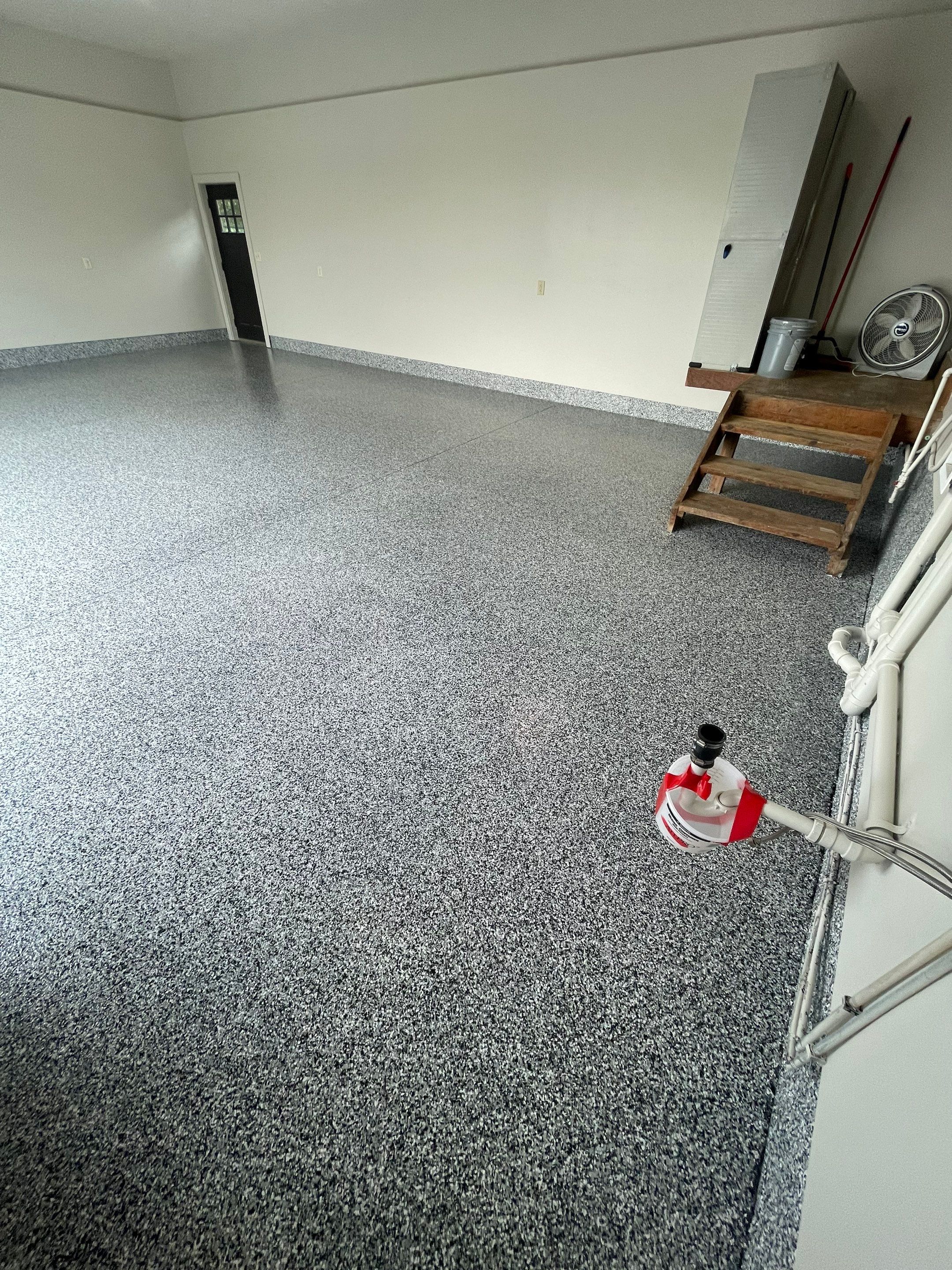 Domino Flake Floor Coating and Crack Repair in Chancellor by Select Painting, Coatings & Garage Cabinets