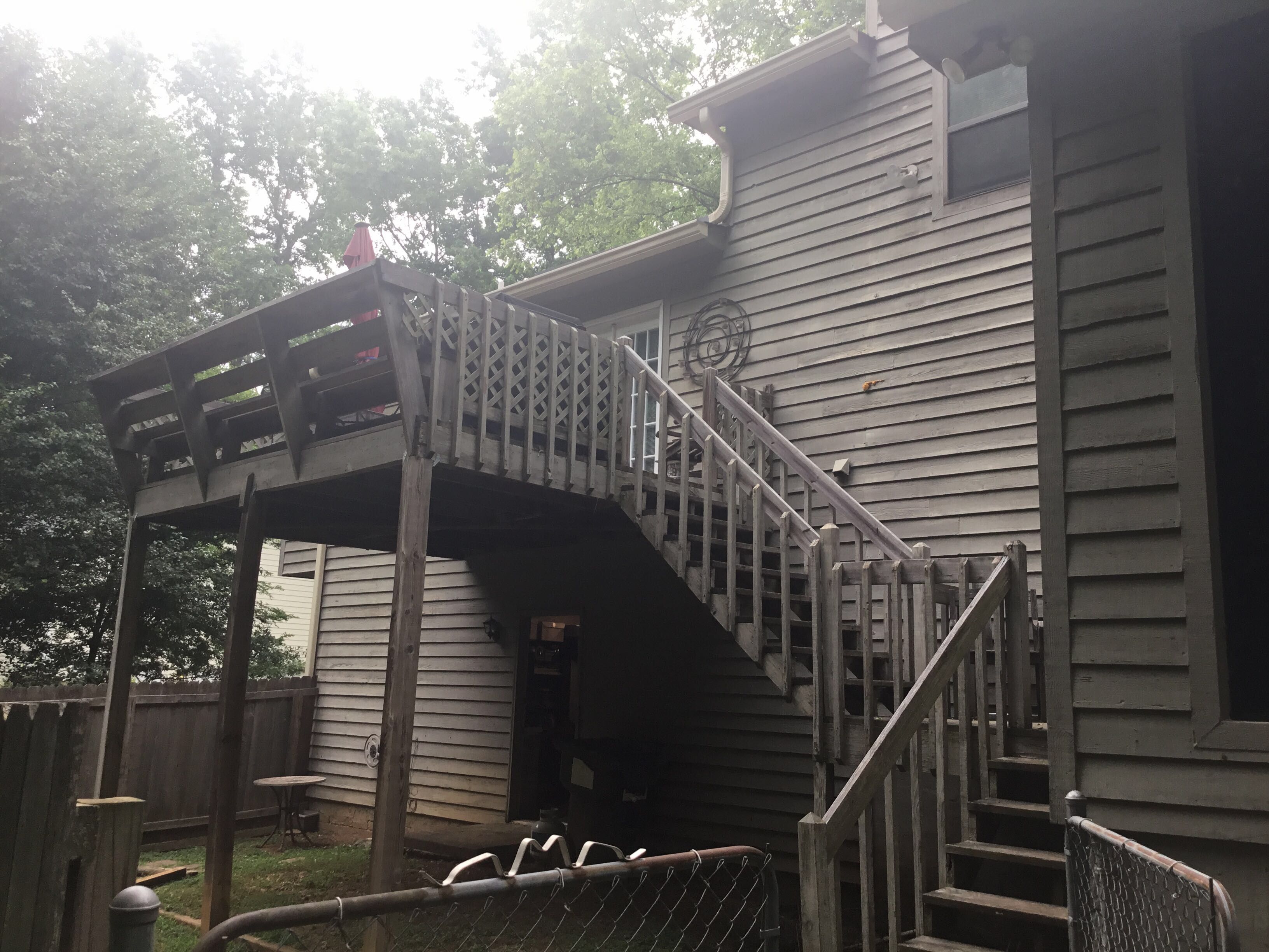 Elevated Wooden Deck and Front Porch Renovation in Marietta by Swift Home Renovations 