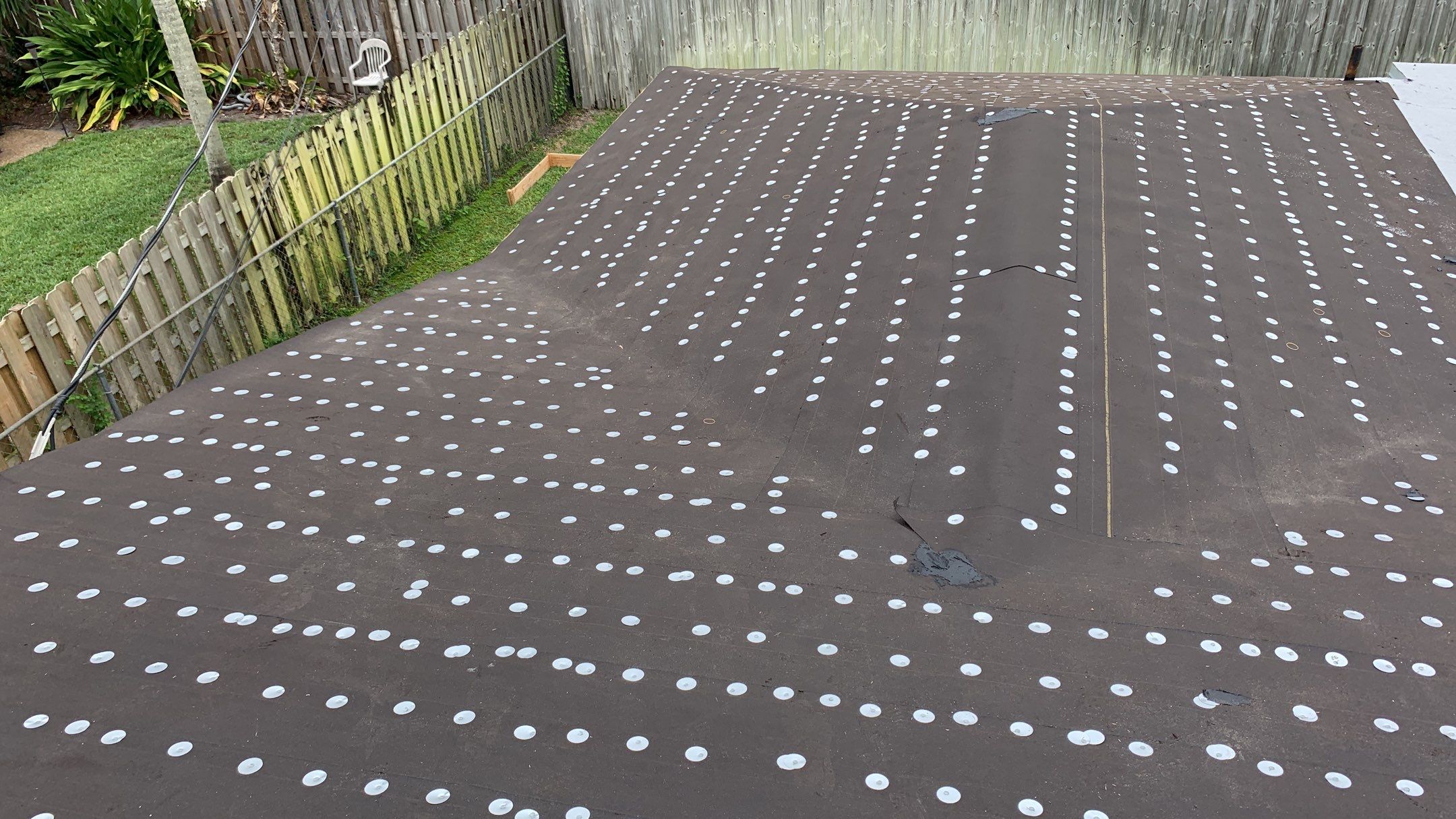 Residential Roofing Installation using 1" Nail strip metal roof by BLUES BROTHERS ROOFING