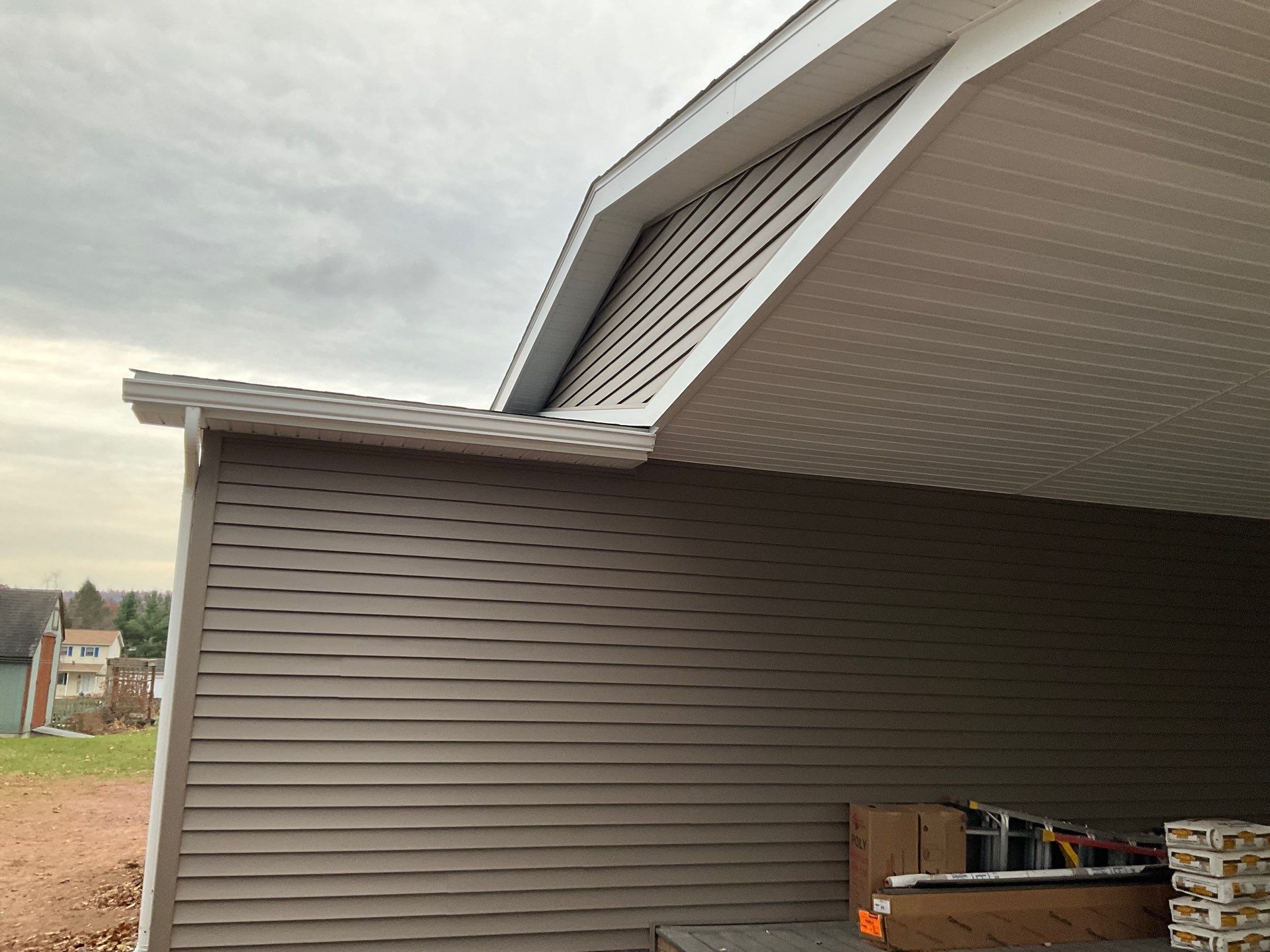 Residential Addition and Covered Porch Roof  by Esh Builders