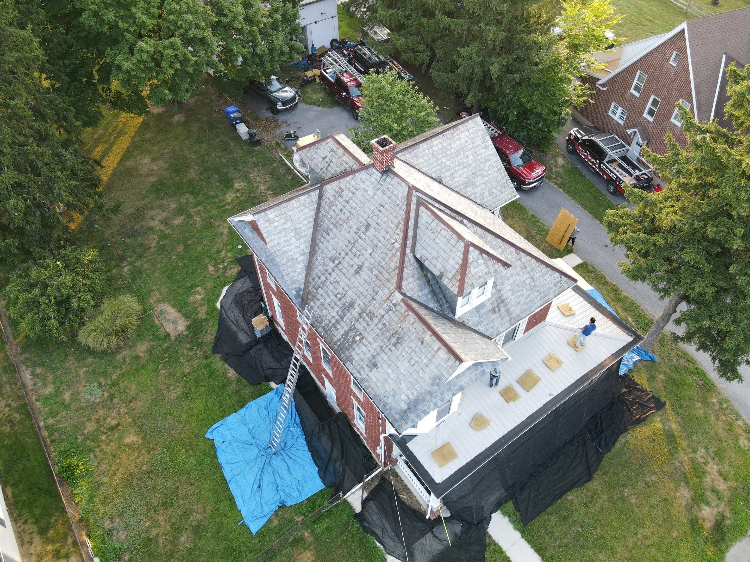 Slate Roof Removal  by Teflon Roofing