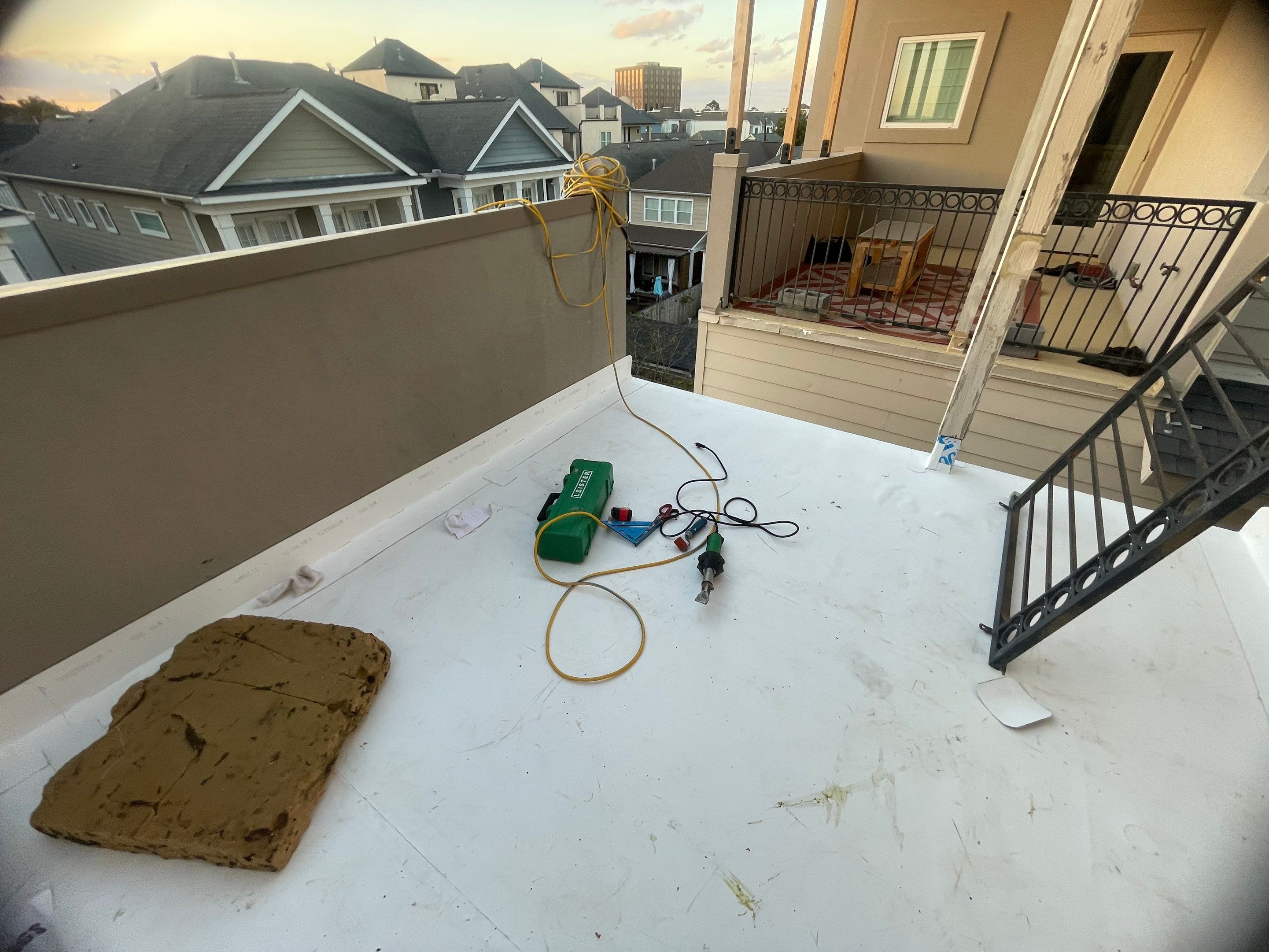 Rooftop Patio Installation by Associates Roofing Unlimited 