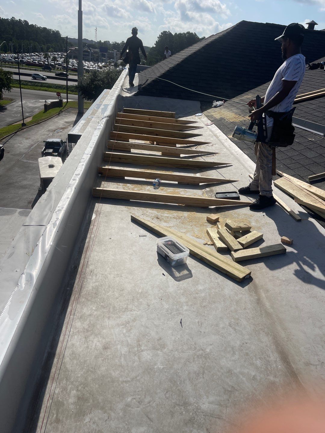 Commercial Roofing Installation using Roof Replacement by American Roofing & Construction LLC