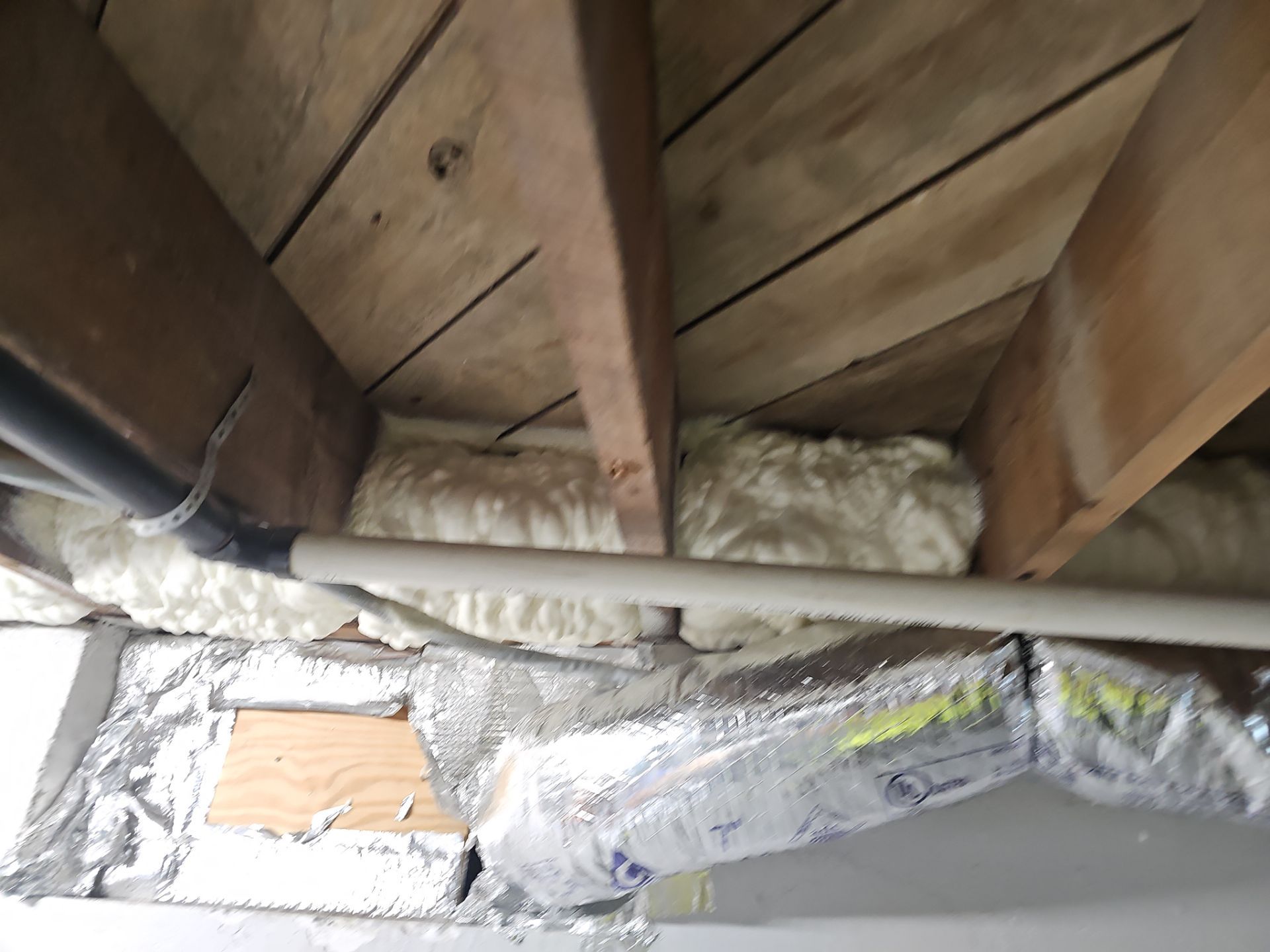 Attic Insulation using open cell spray foam by NYS Foam & Energy
