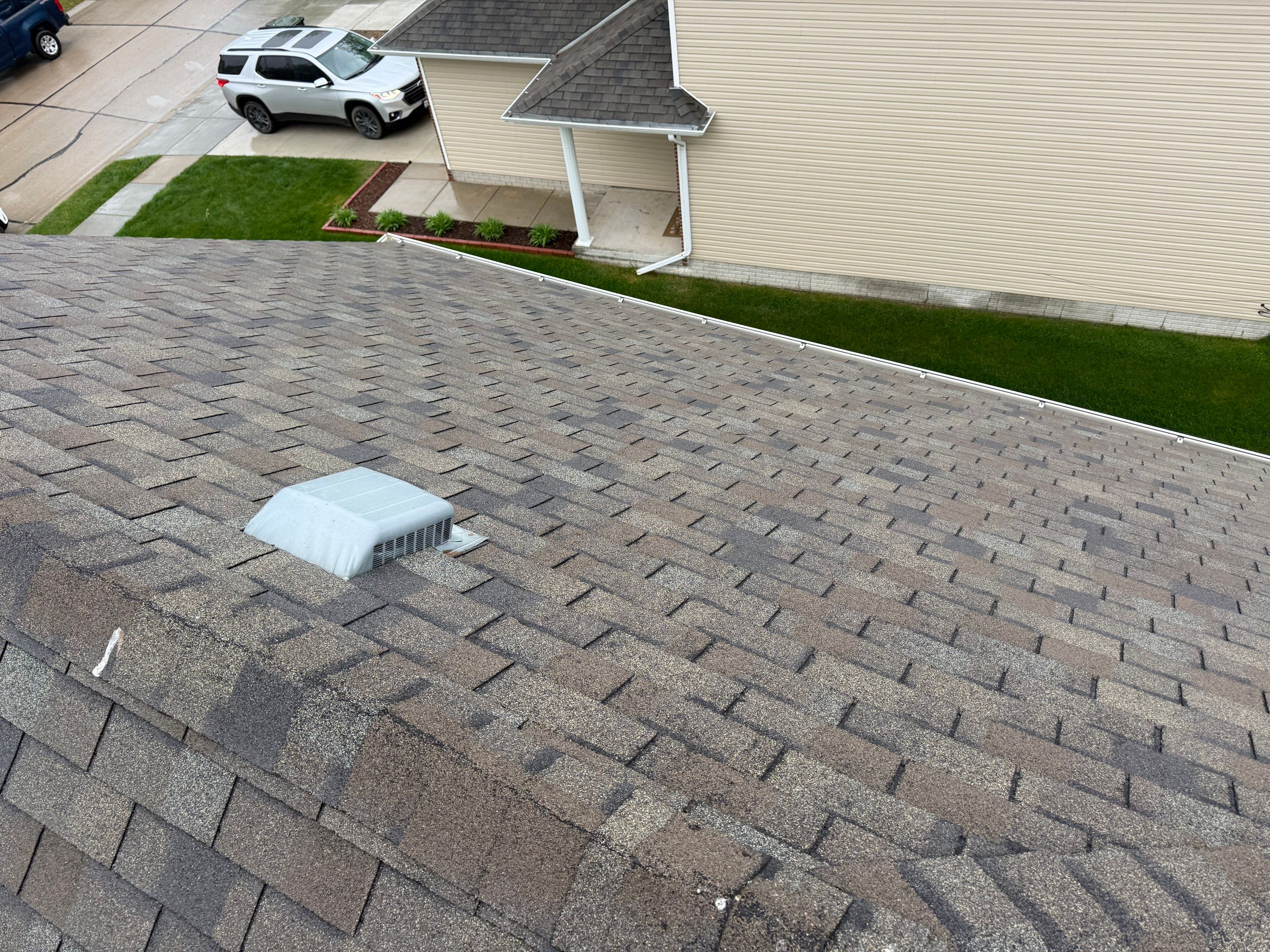 Residential Architectural Shingle Roof Replacement and Gutter Upgrade in Lincoln by Star Home