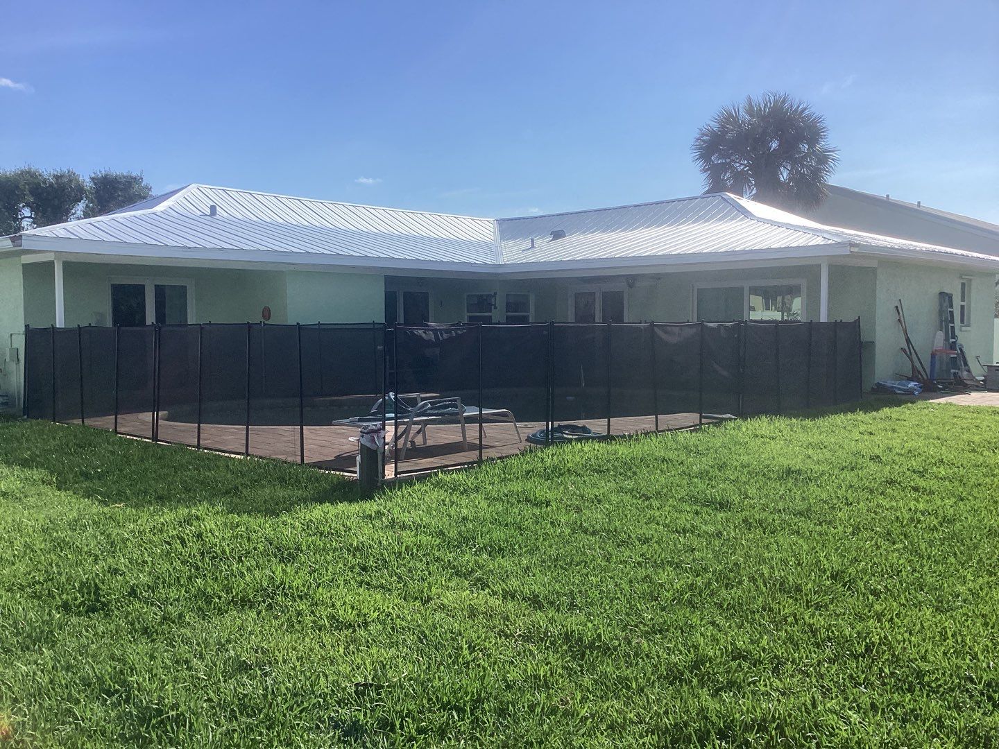 White Down Spouts using Downspout Extension in Fort Myers FL by Gutter Professors