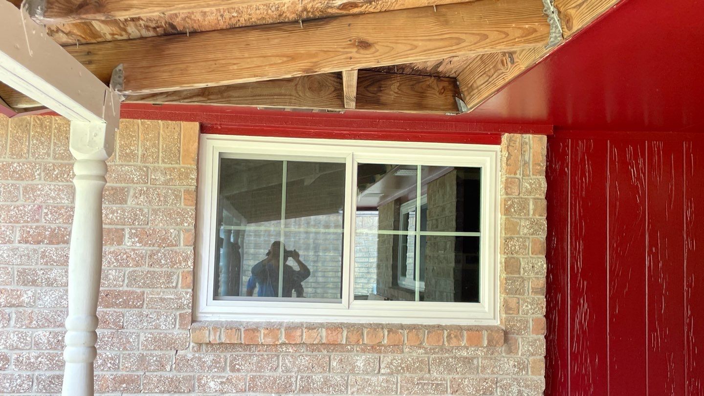 Black and white and red all over by Bayfront Roofing and Construction