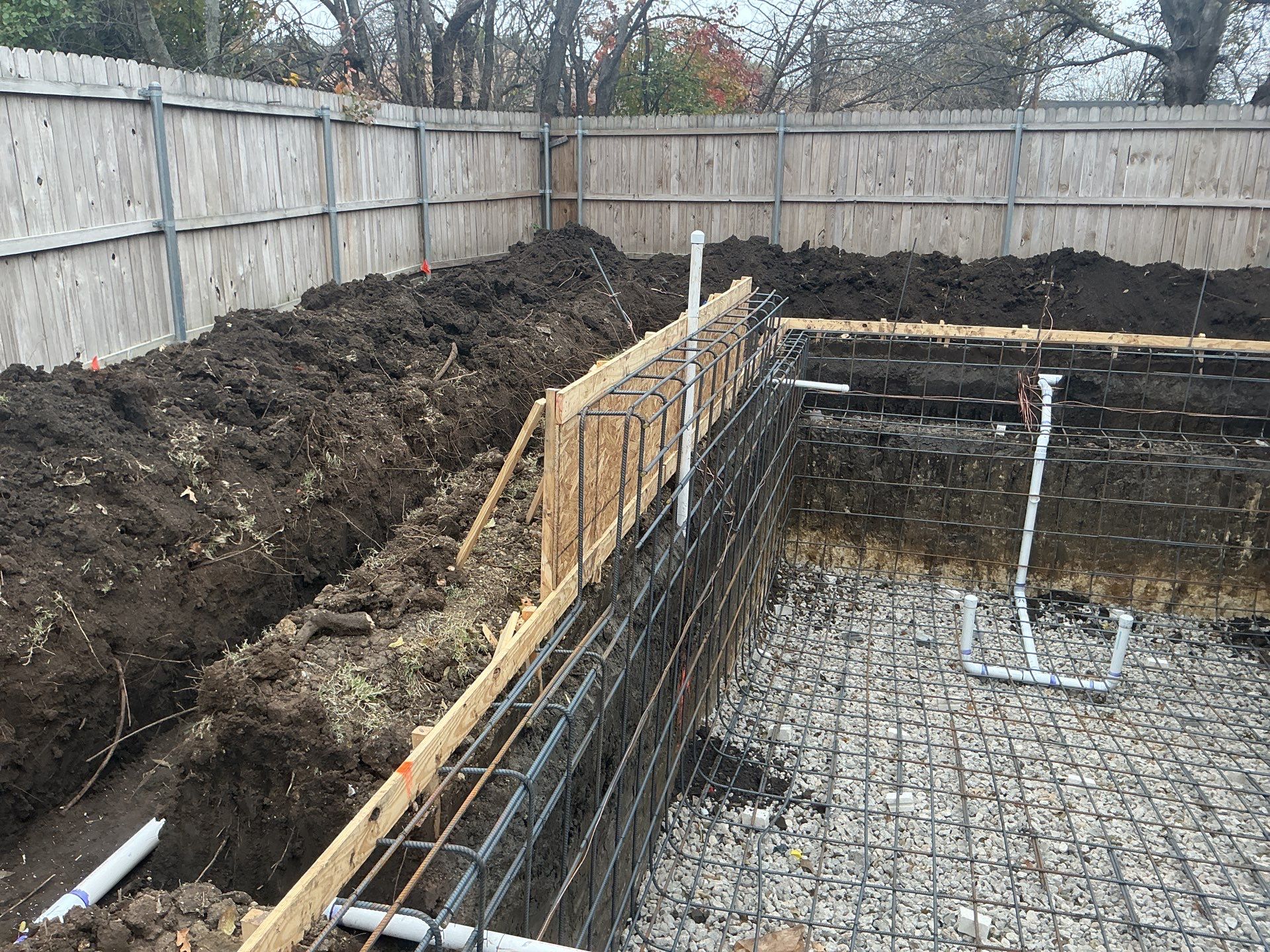 Geometric Pool with Stone Waterfall Wall by Pinnacle Pools and Spas - DFW